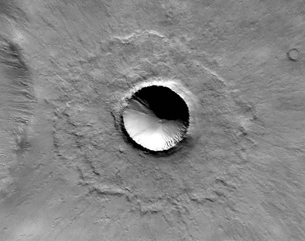 Today's VIS image shows two craters in Terra Cimmeria just nort…