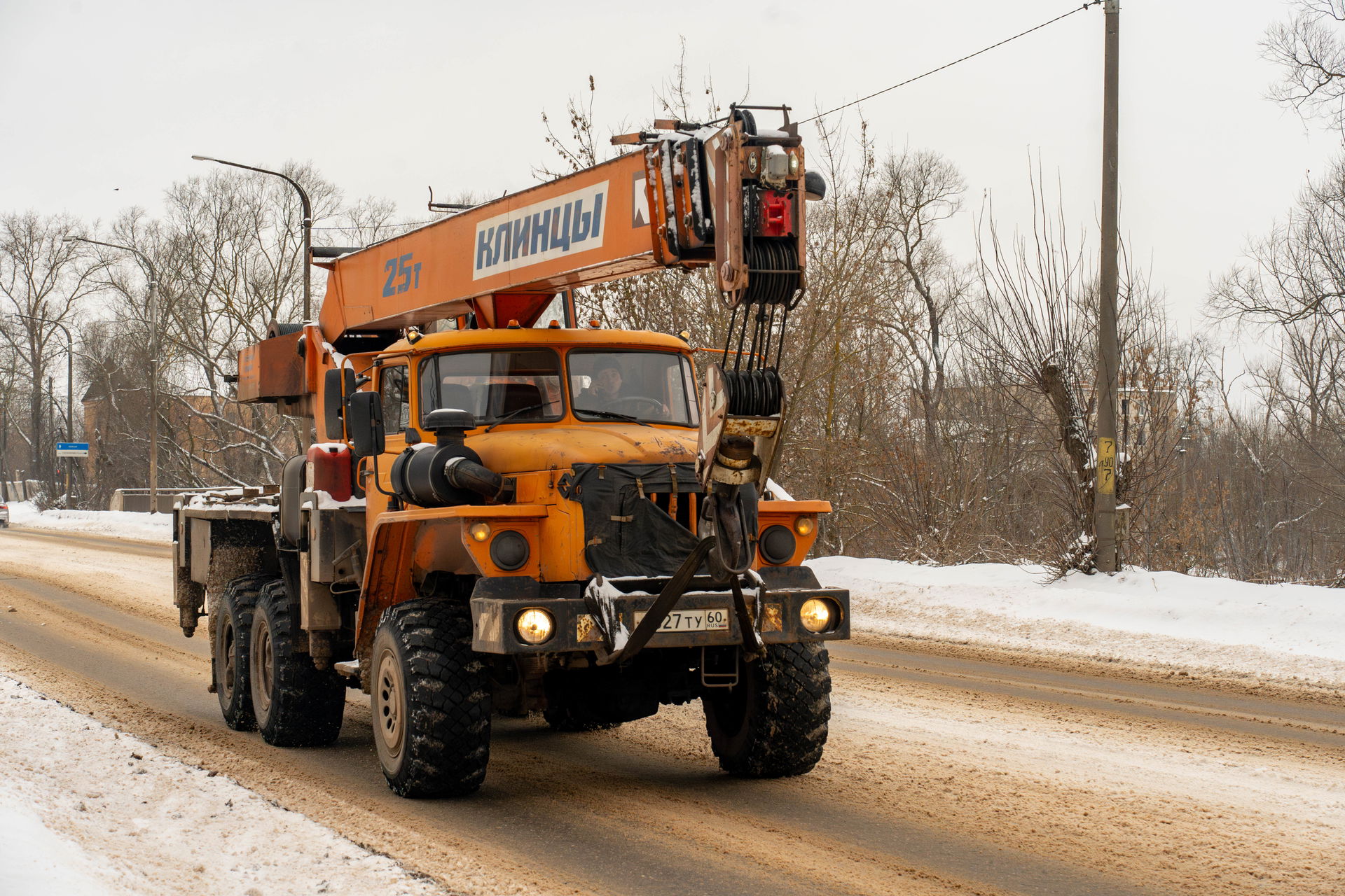 Ural crane truck ath the Severnyi bridge photographed at winter…