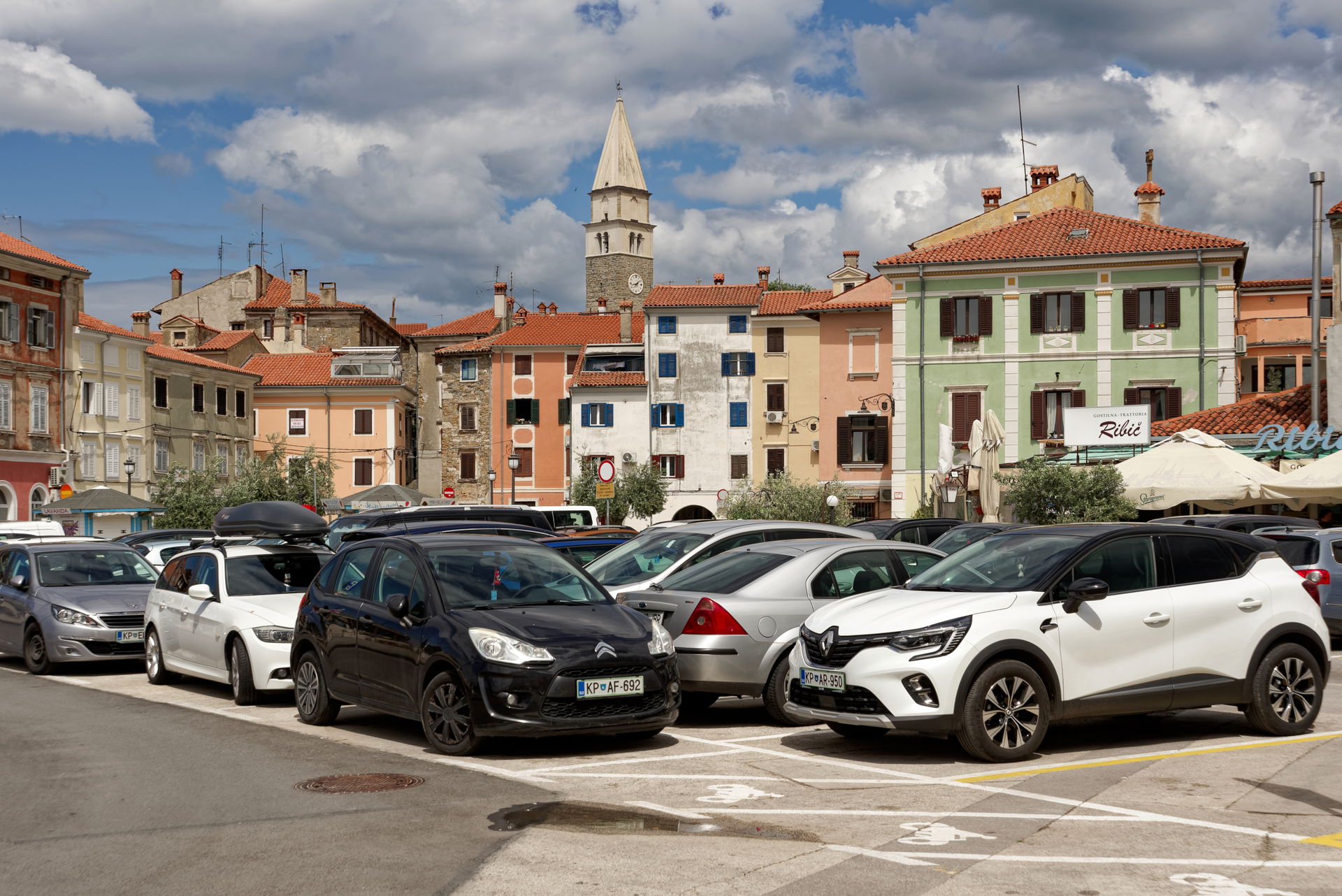 Old town of Izola. In the back, the tower of the parish church …