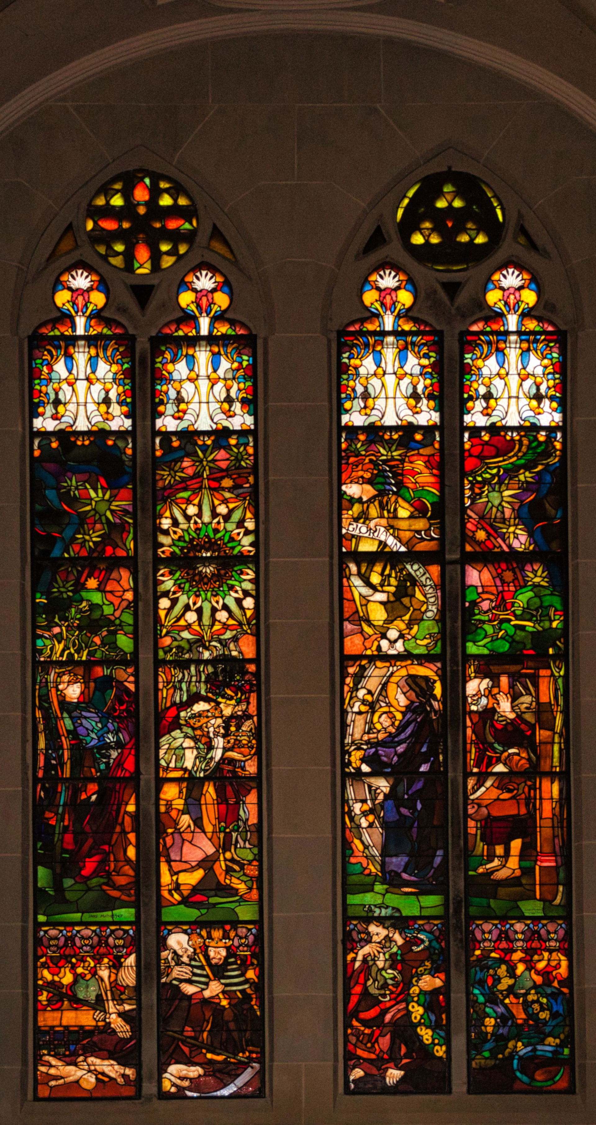 In this stained glass window, Józef Mehoffer depicts the Adorat…