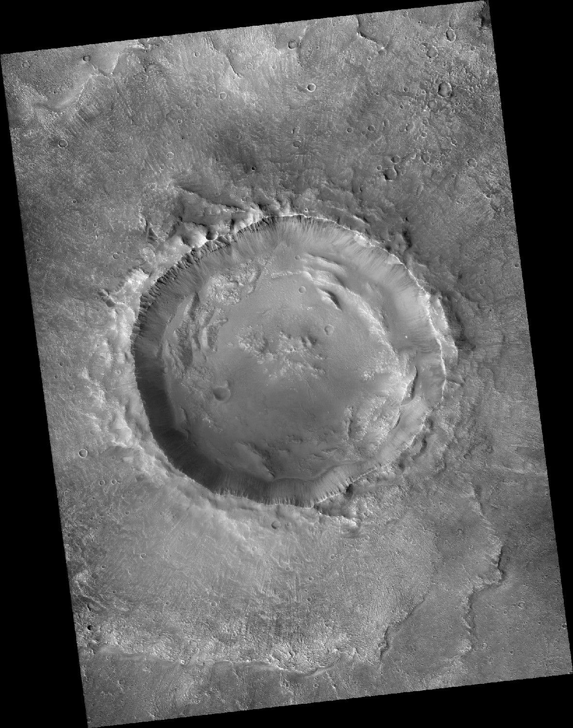 Tarsus crater on Mars.
Image ID	J07_047396_2033_XN_23N040W
Cent…