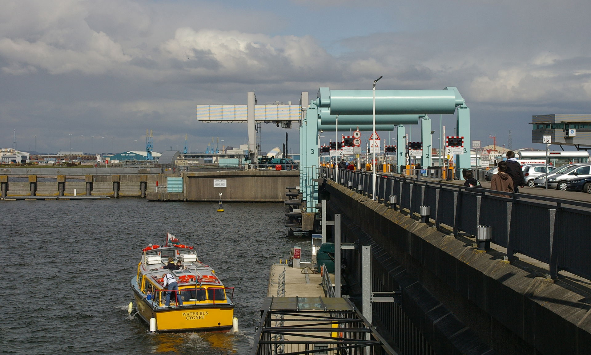 The water bus "Cygnet" departs the Cardiff Bay locks.