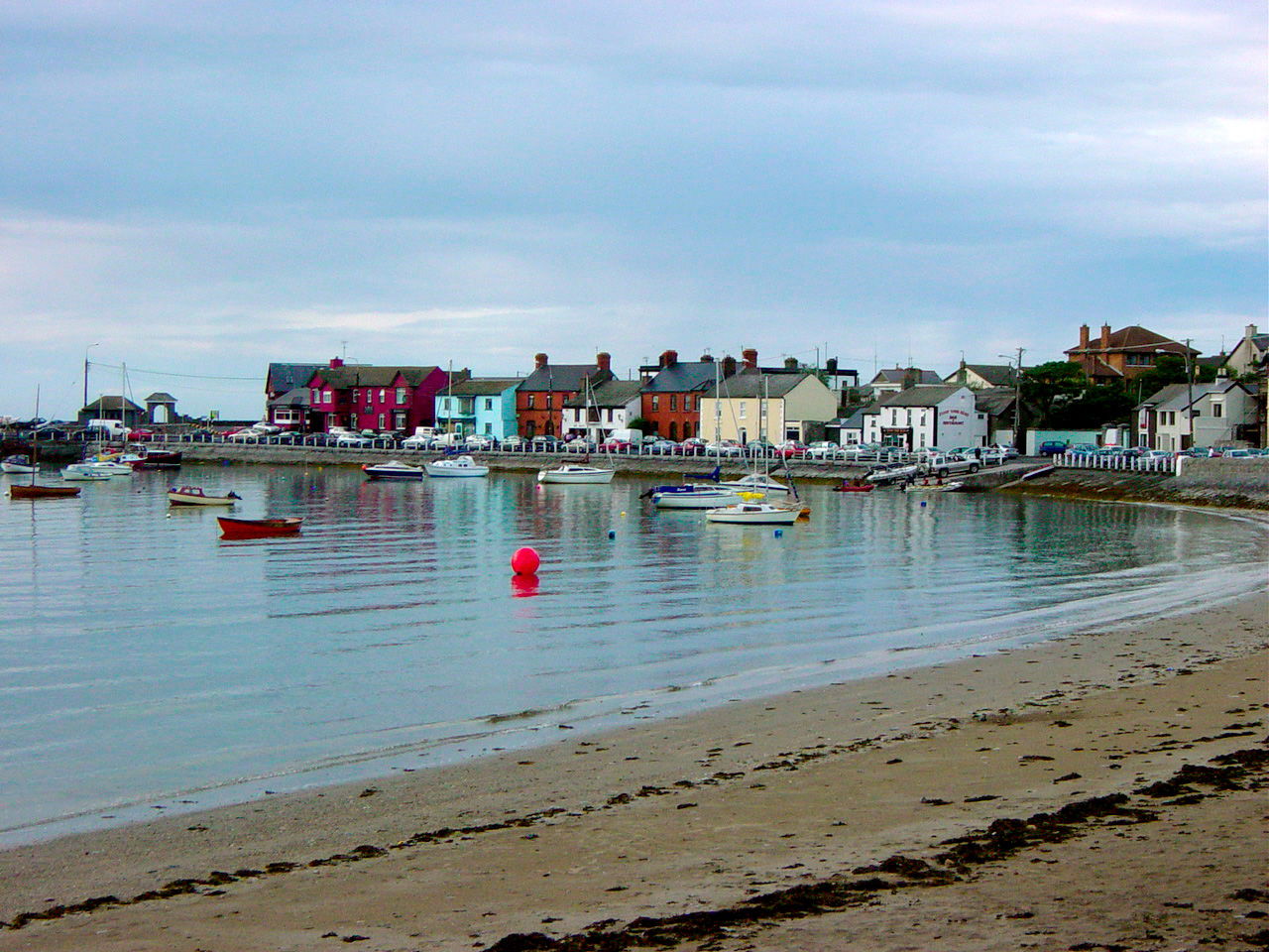 Brightly painted houses line the shore at Skerries harbour.