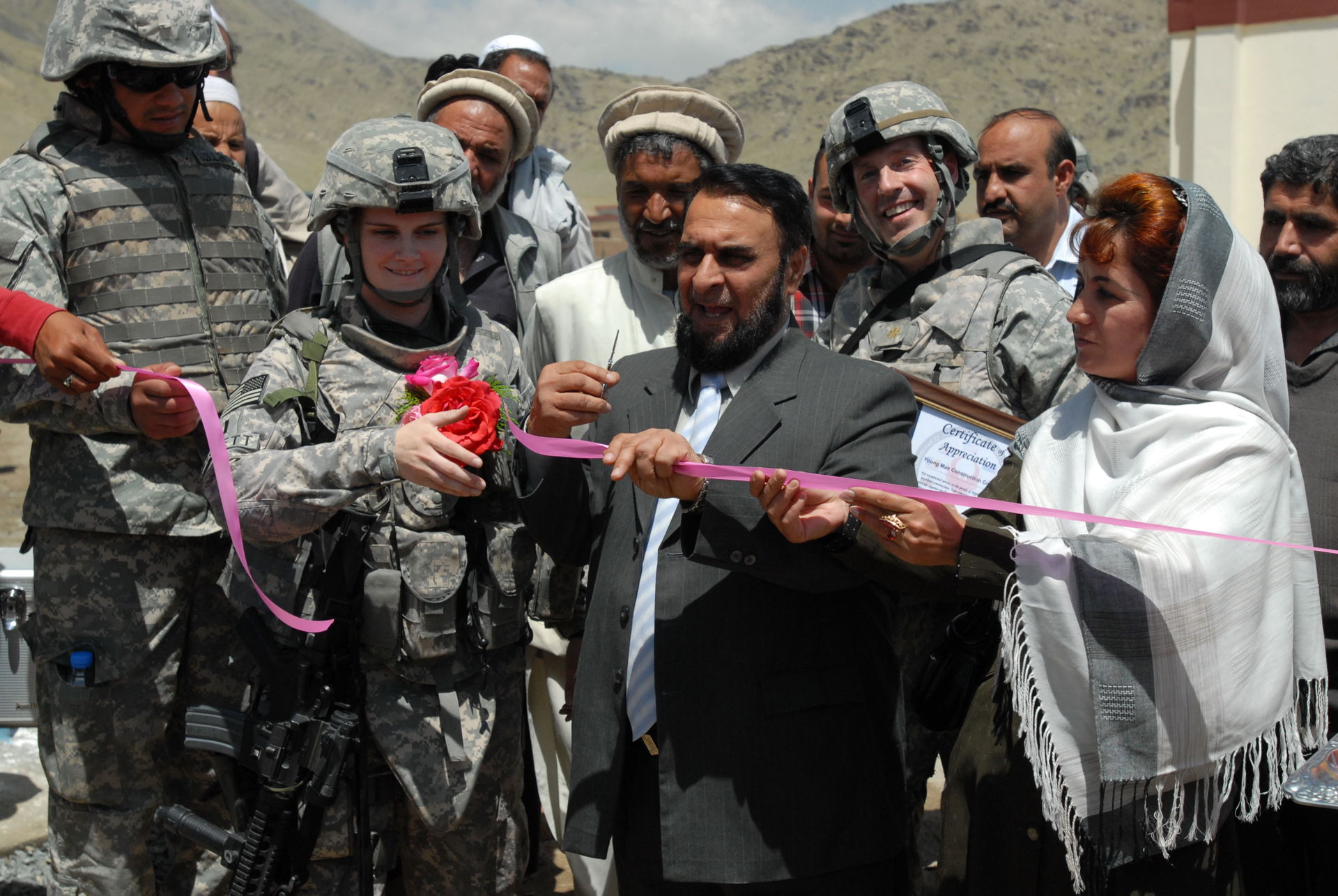 Members from the Ministry of Education and Soldiers from Camp P…