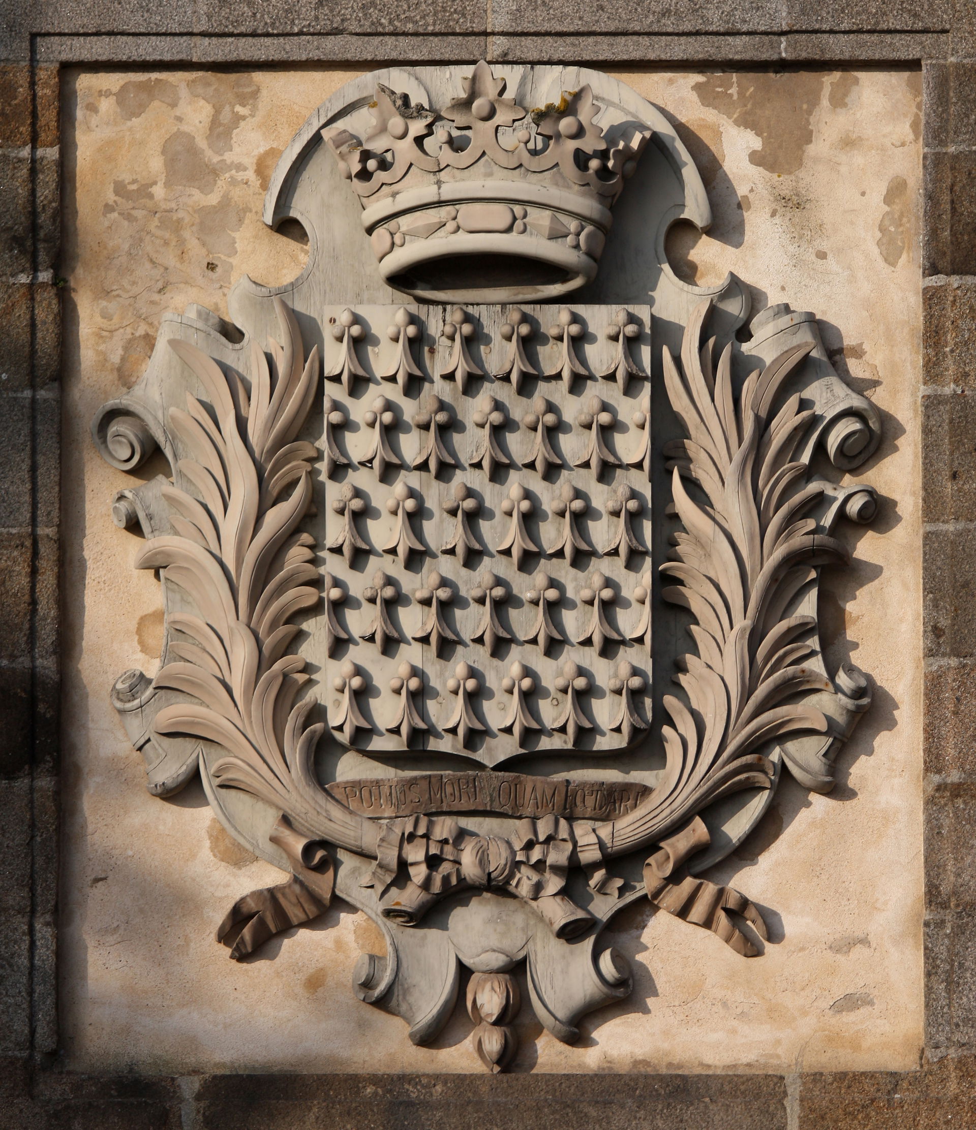 The coat of arms of Brittany, over the gates of the fortified c…