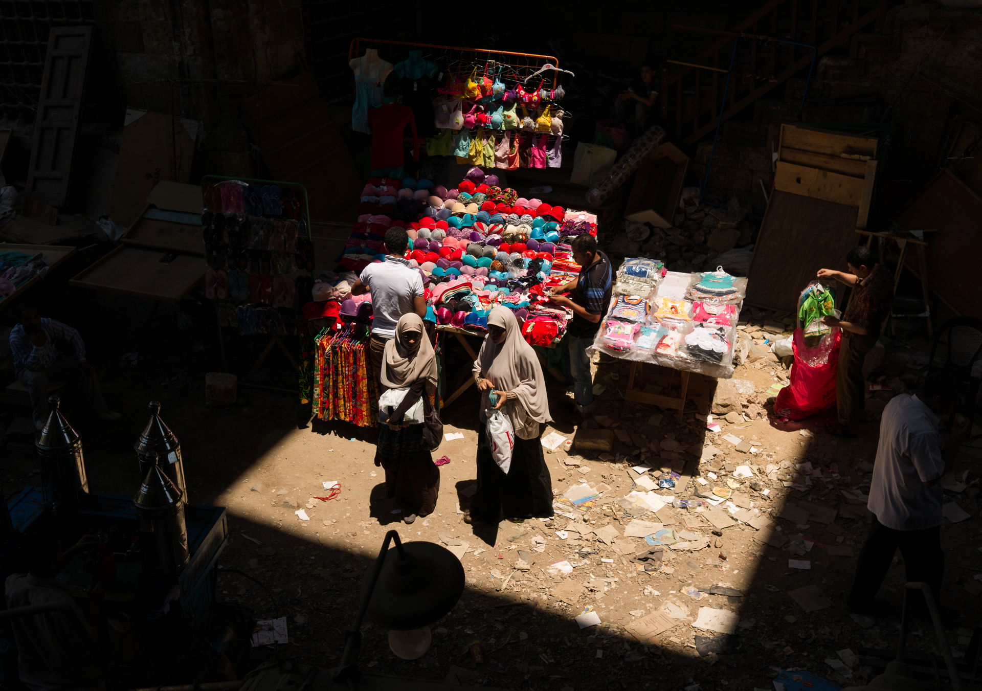 Two Egyptian women shopping at a market next to the Al-Ghouri C…