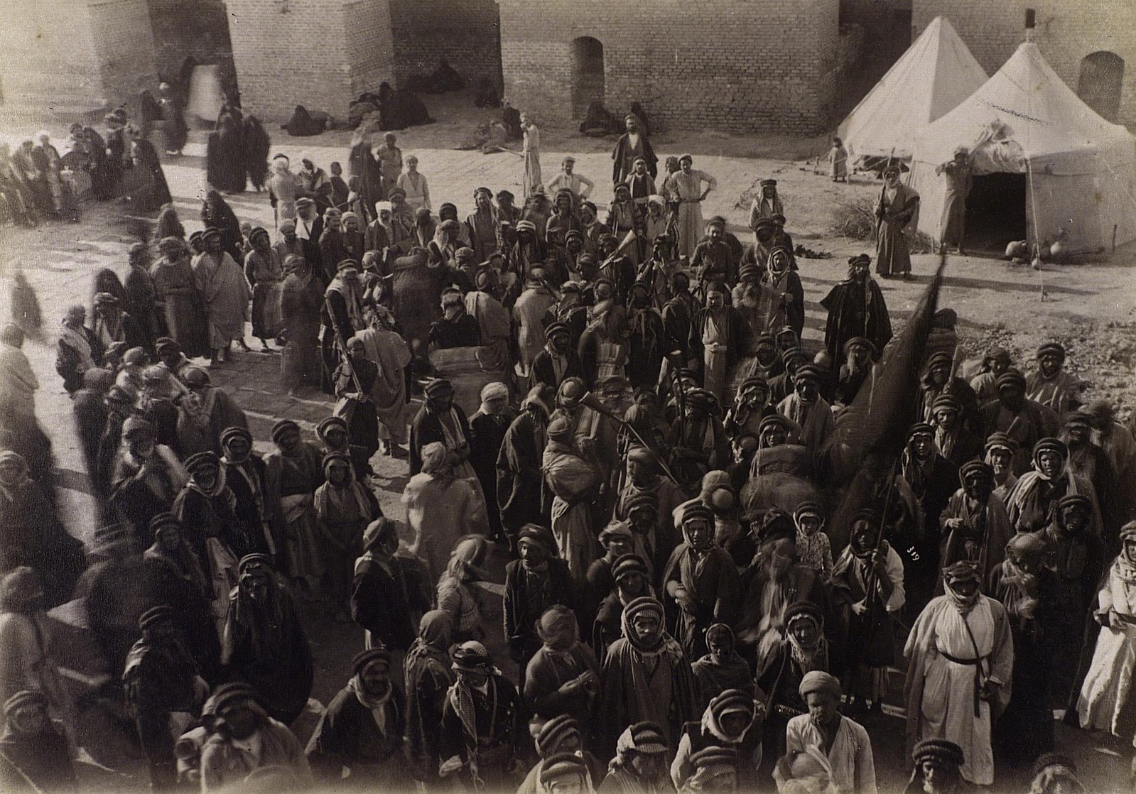 A group of men gathering in Ahwaz cicra 1900, Album number 12 o…