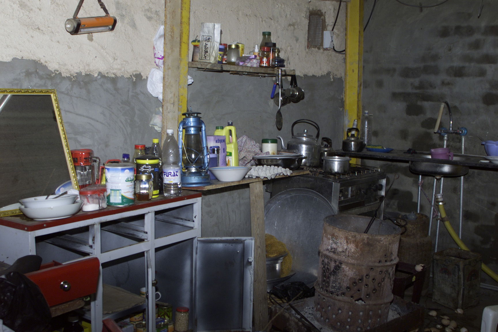 Ad Dawr, Iraq (Dec. 17, 2003) -- A modest array of items sits i…