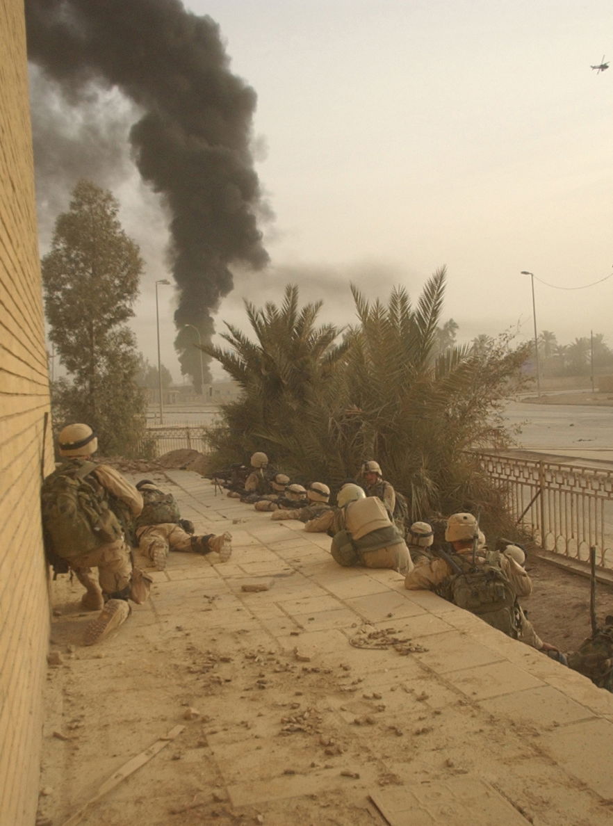 Soldier from B company 2/325th watch an Iraqi paramilitary unit…