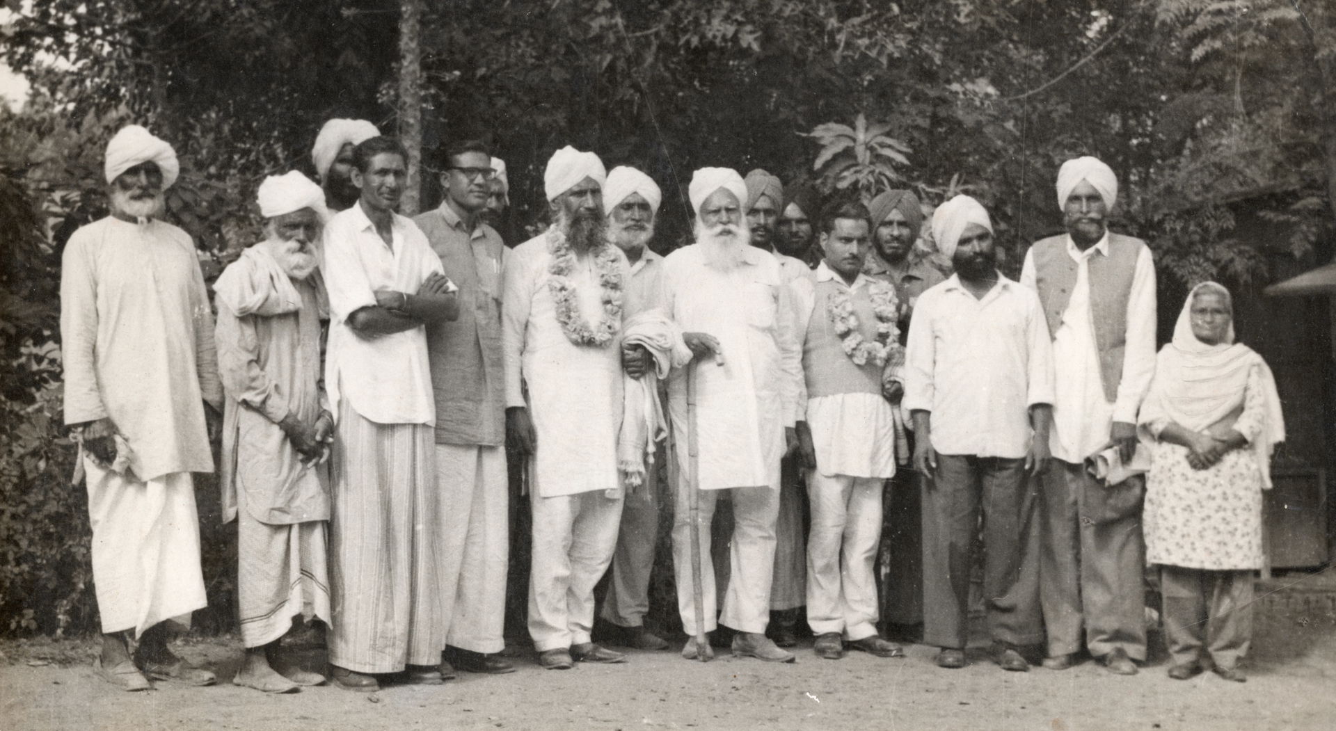 Garlanded: Pakhar S Maherhu (left), Naseeb S Samra (right), oth…