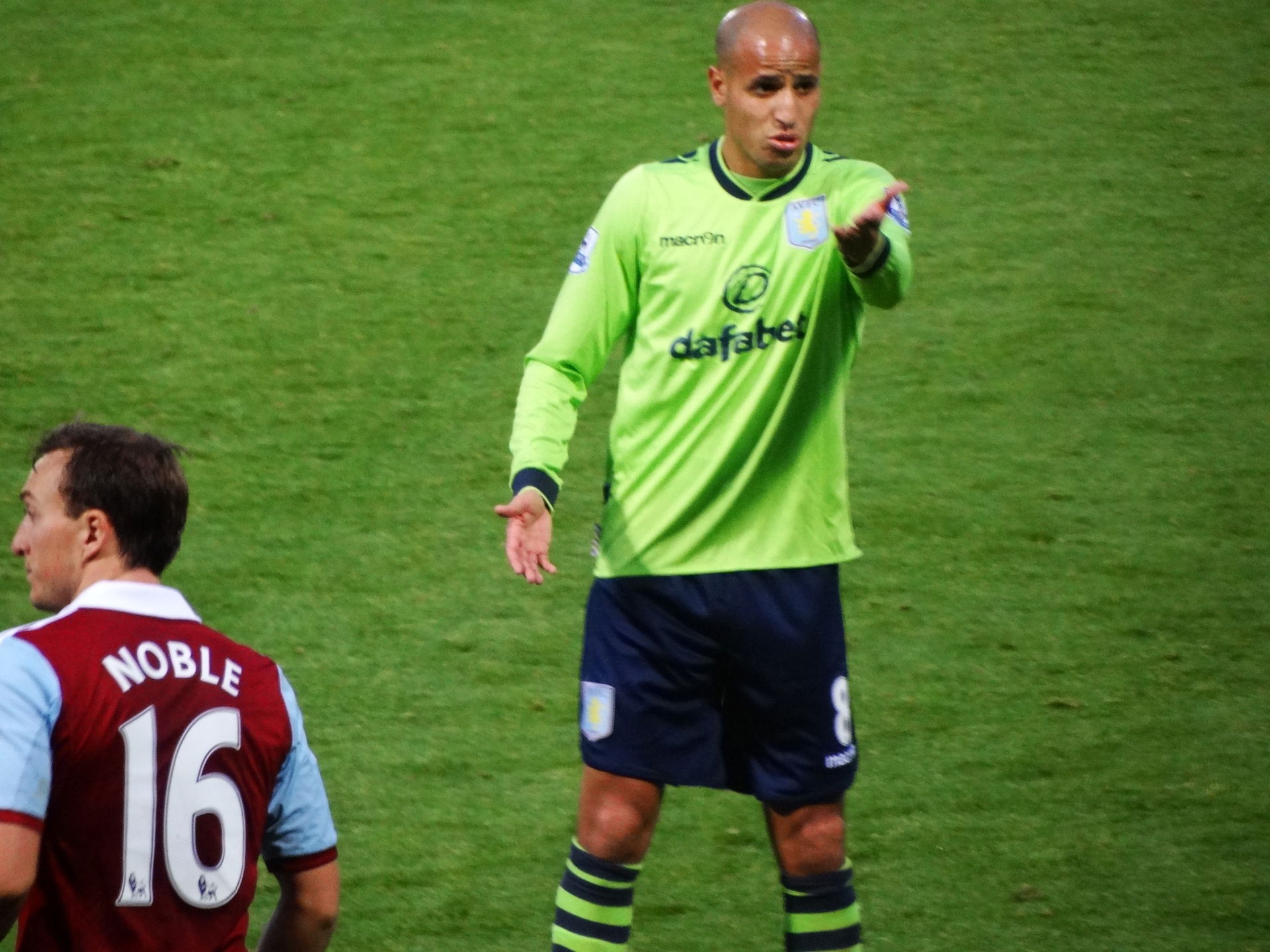 Aston Villa's Karim El Ahmadi gestures to his team-mates