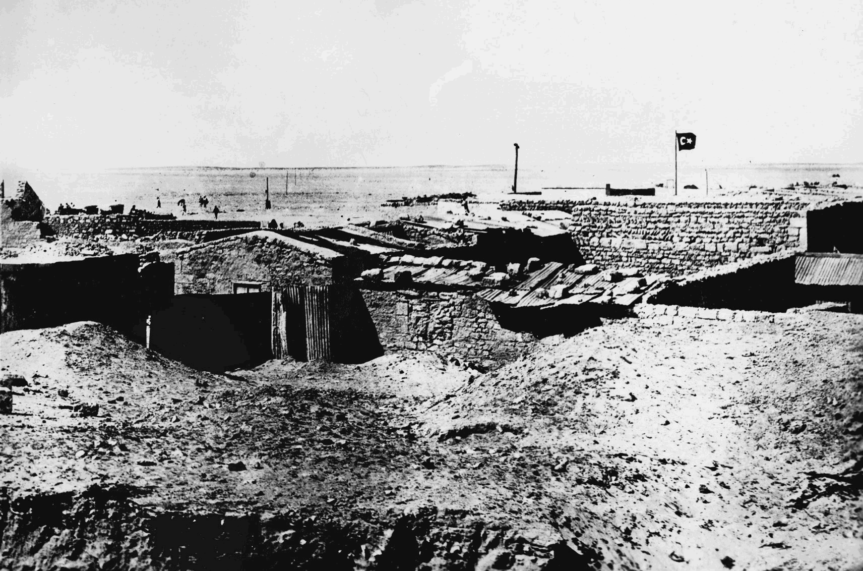 Photograph of a Senussi centre in Ajdabiya. The Senussi flag, a…