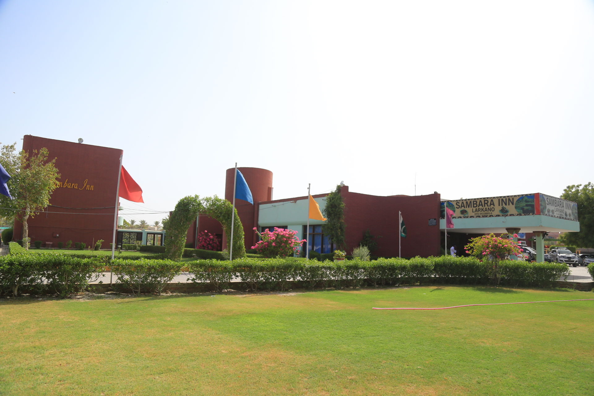 This is exterior view of Sambara Inn Hotel Larkana, operated by…