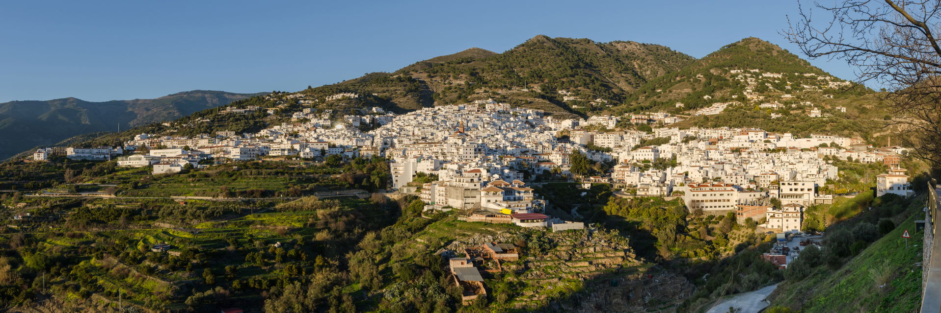Cómpeta - panoramic view at golden hour shortly before sunset.