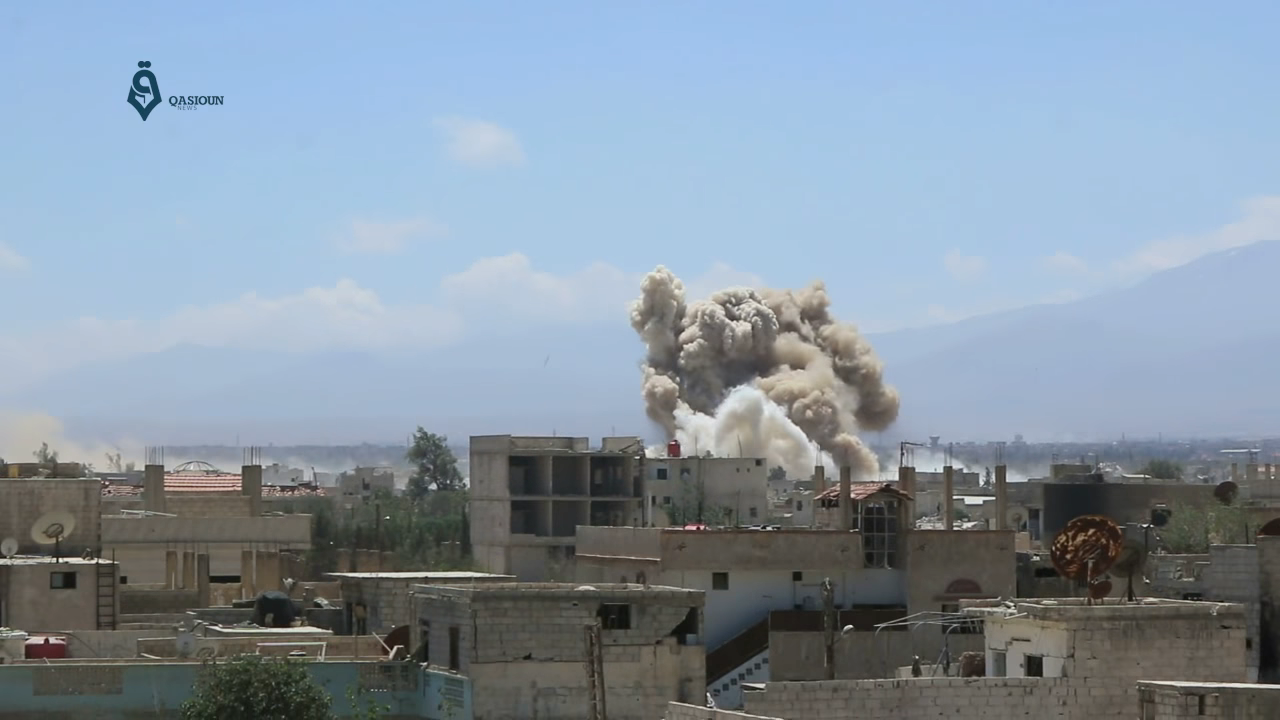 Two bombs are dropped by the Syrian Arab Air Force on the city …