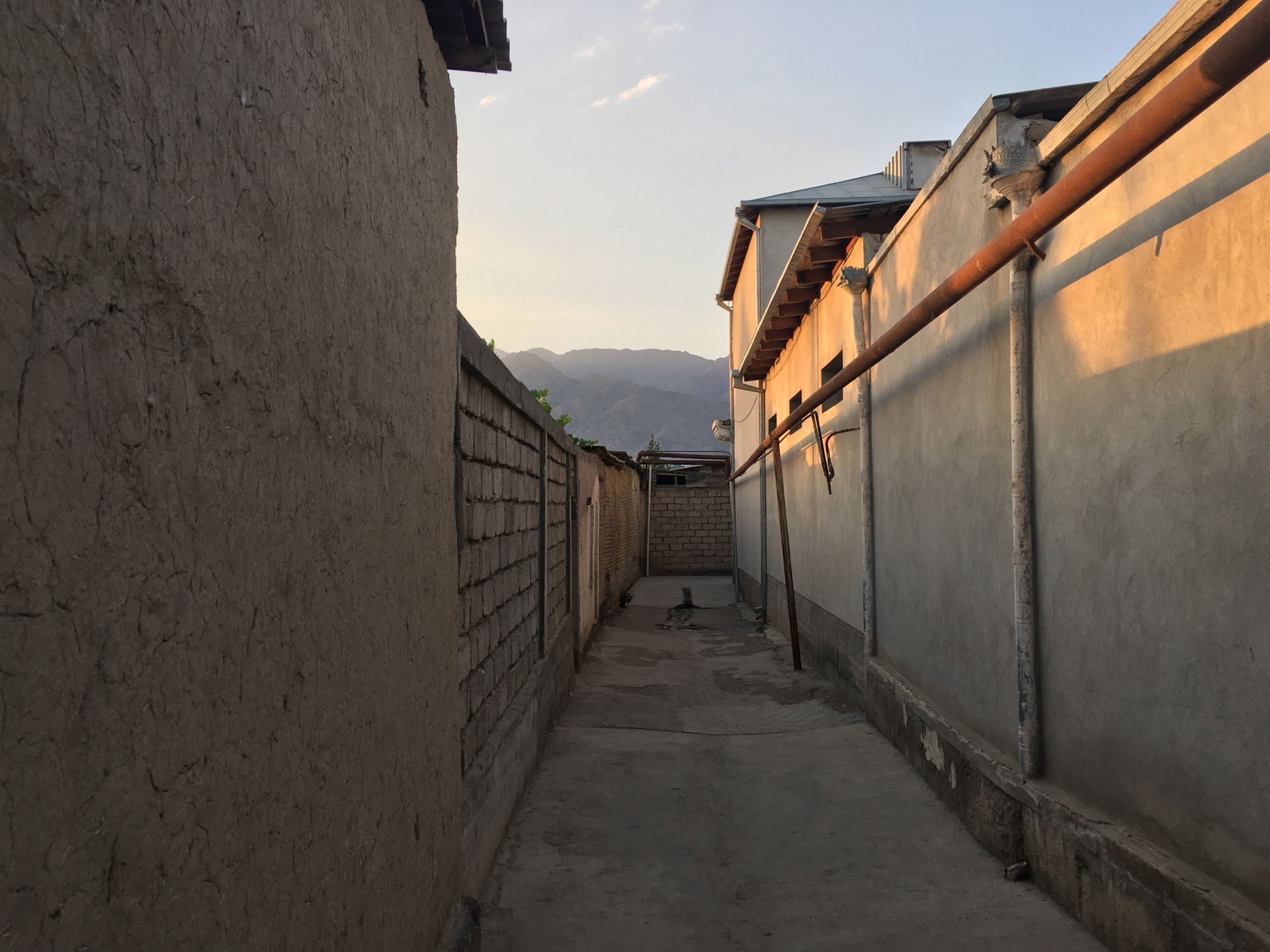 Street at sunset in Khujand, Tajikistan, near Panjshanbe Bazaar.