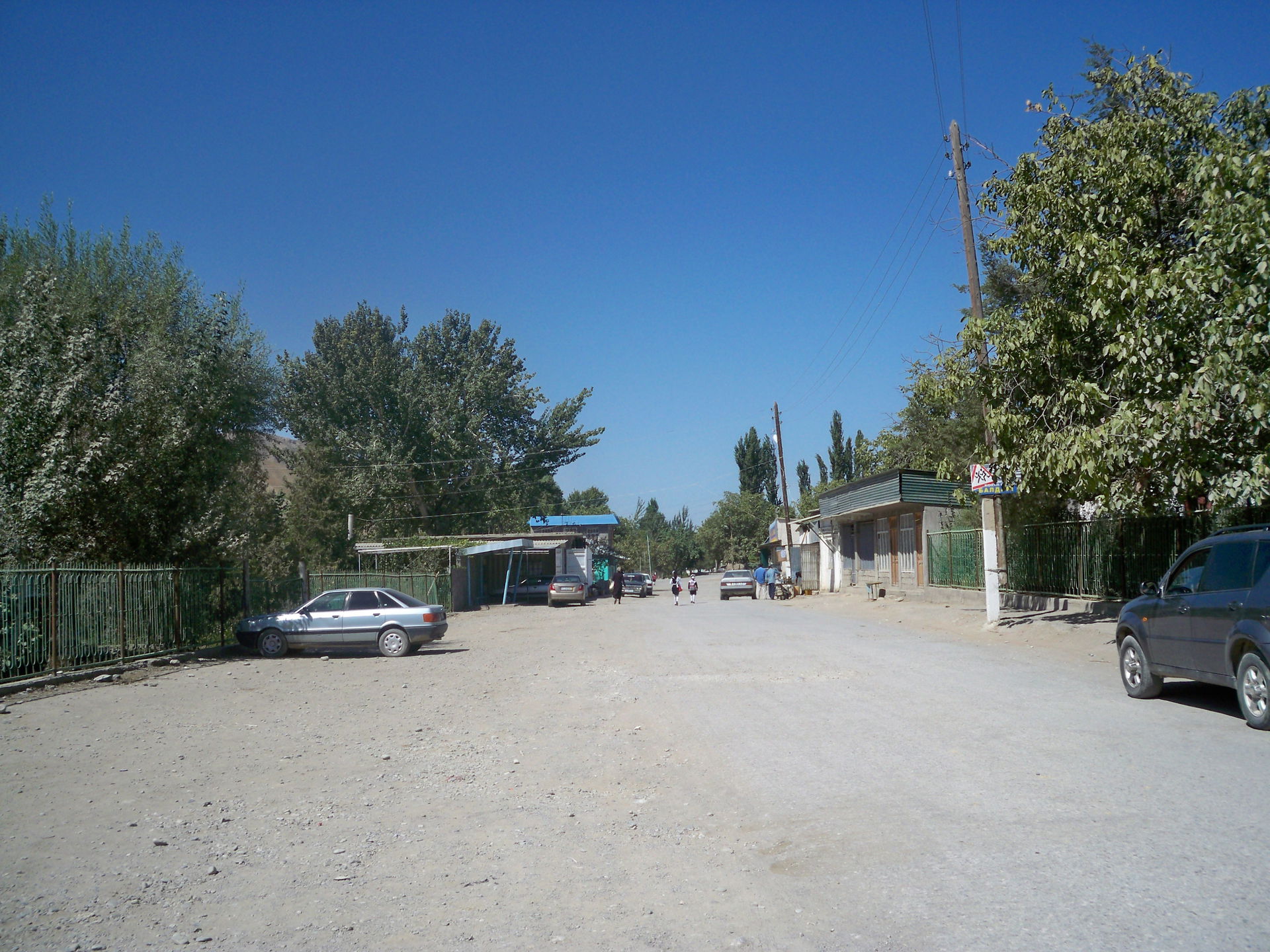 A central street in the village of Beshkent. Leilek District, K…