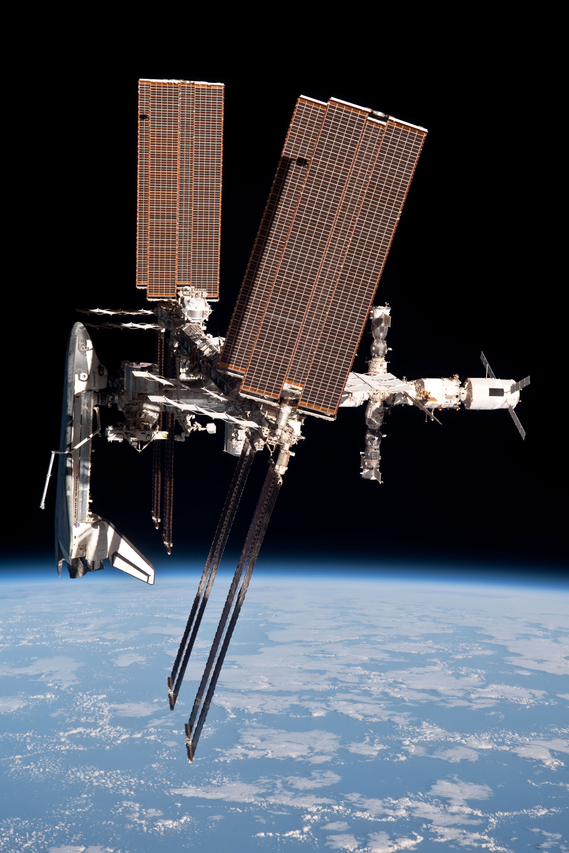 This image of the International Space Station and the docked sp…