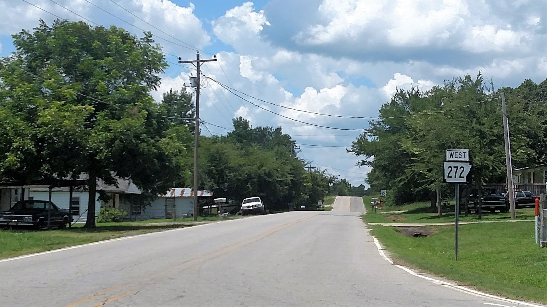 First reassurance marker west of the US 71B intersection in Wal…