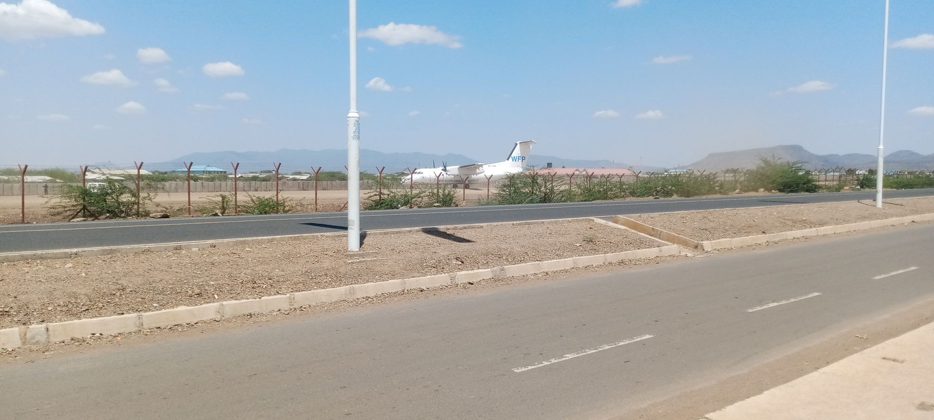 A picture taken by mobile phone on the roadside of Kama Air Str…