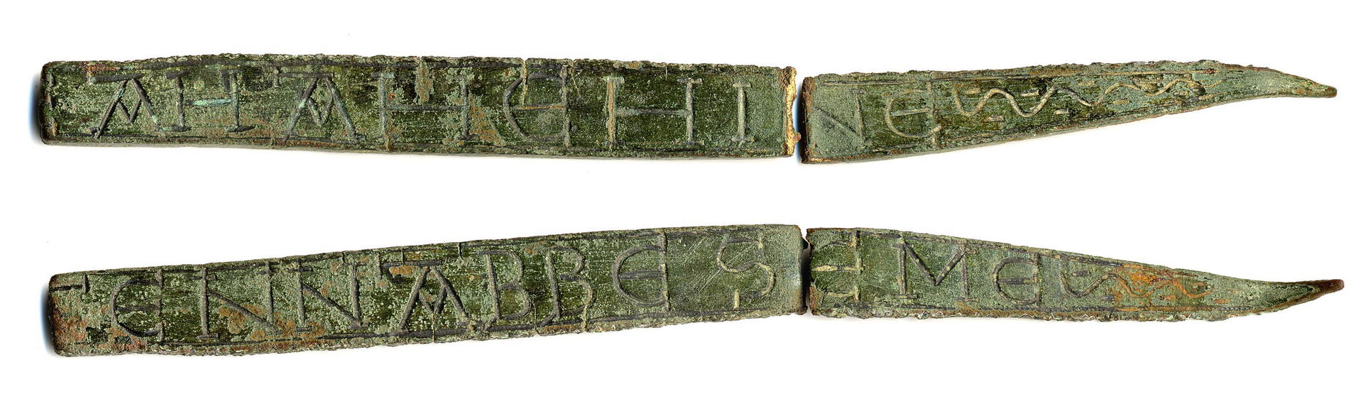Copper alloy inscribed strip which is broken into two pieces an…