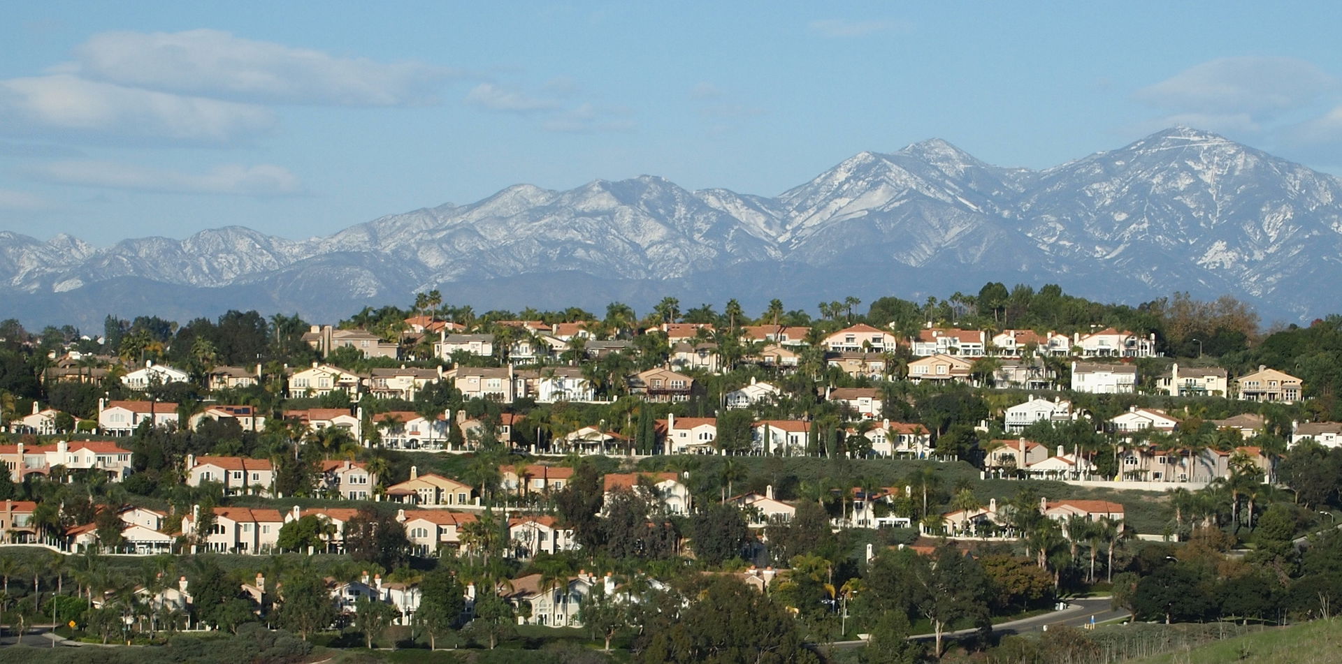Rows of look alike tract homes in Laguna Niguel with the Santa …