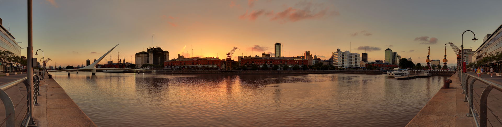 Panorama of Buenos Aires' Puerto Madero district at sunset, one…