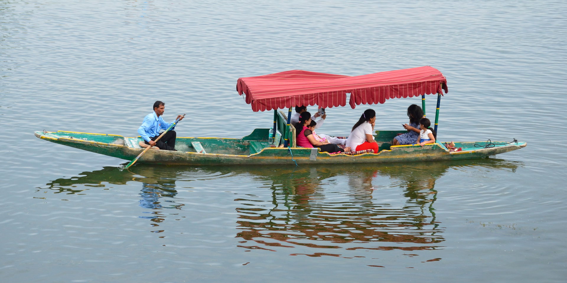 Shikara on the Sukhna Lake in Chandigarh, India.