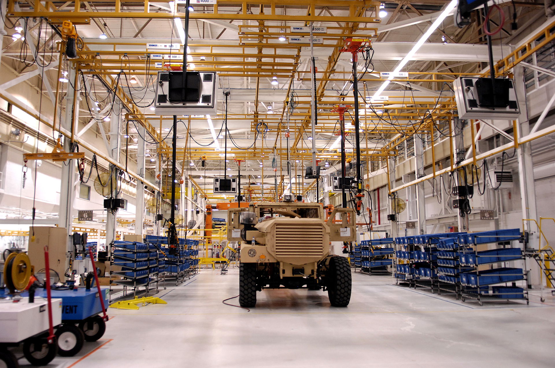An MRAP vehicle waits to be completed in the fully automated se…