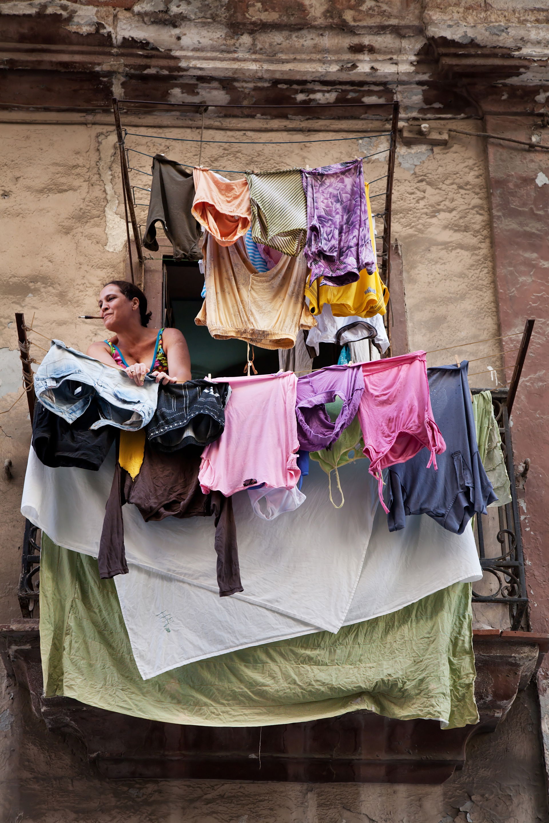 A lady taking care of her wash. Havana (La Habana), Cuba