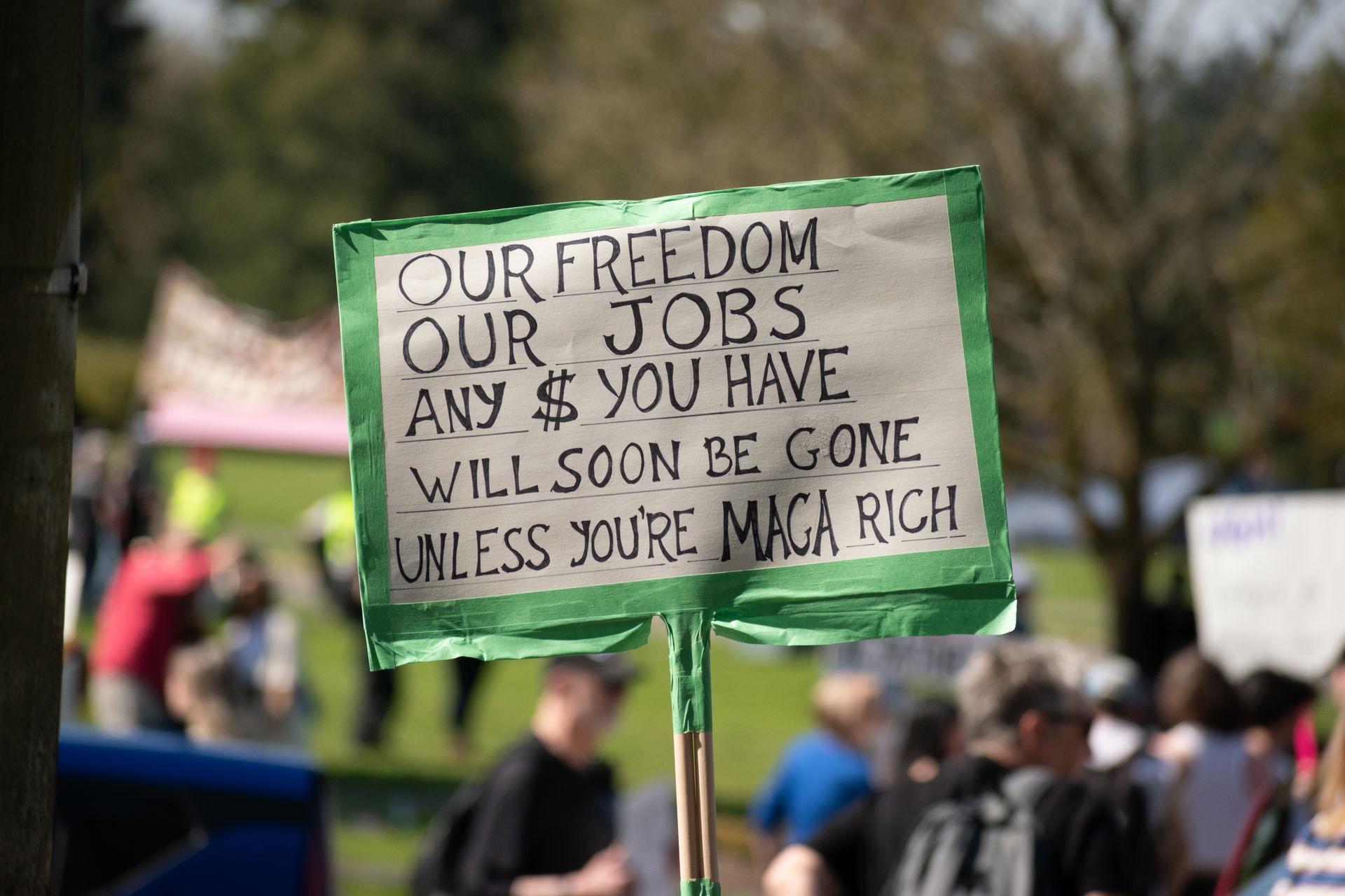 A sign at a Hands Off rally at the Washington State Capitol in …