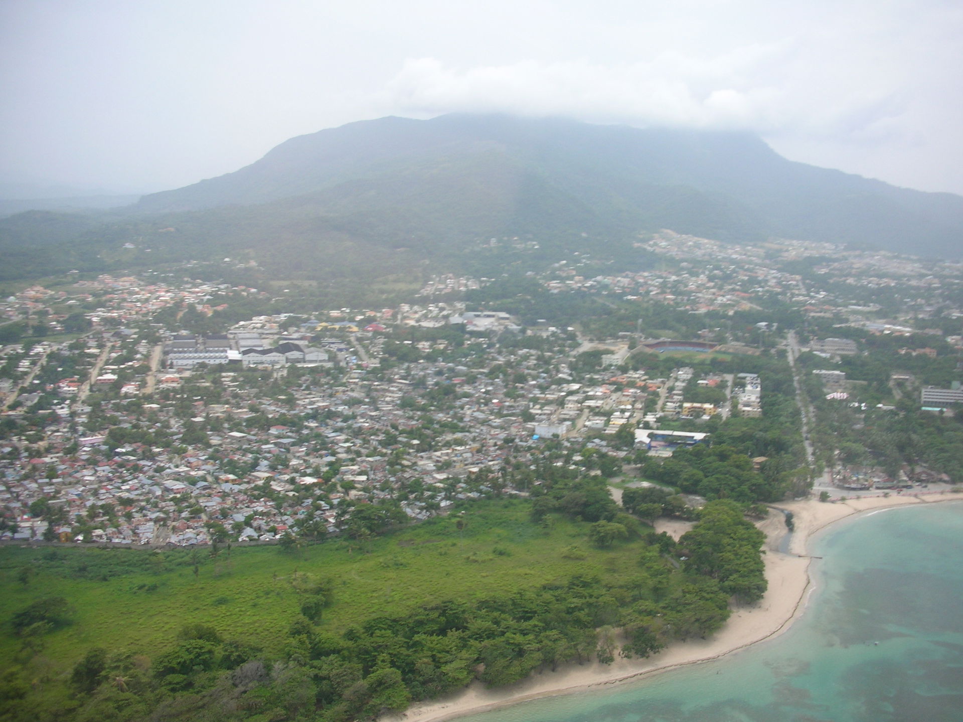 A view of Puerto Plata from the air looking towards Pico Isabel…