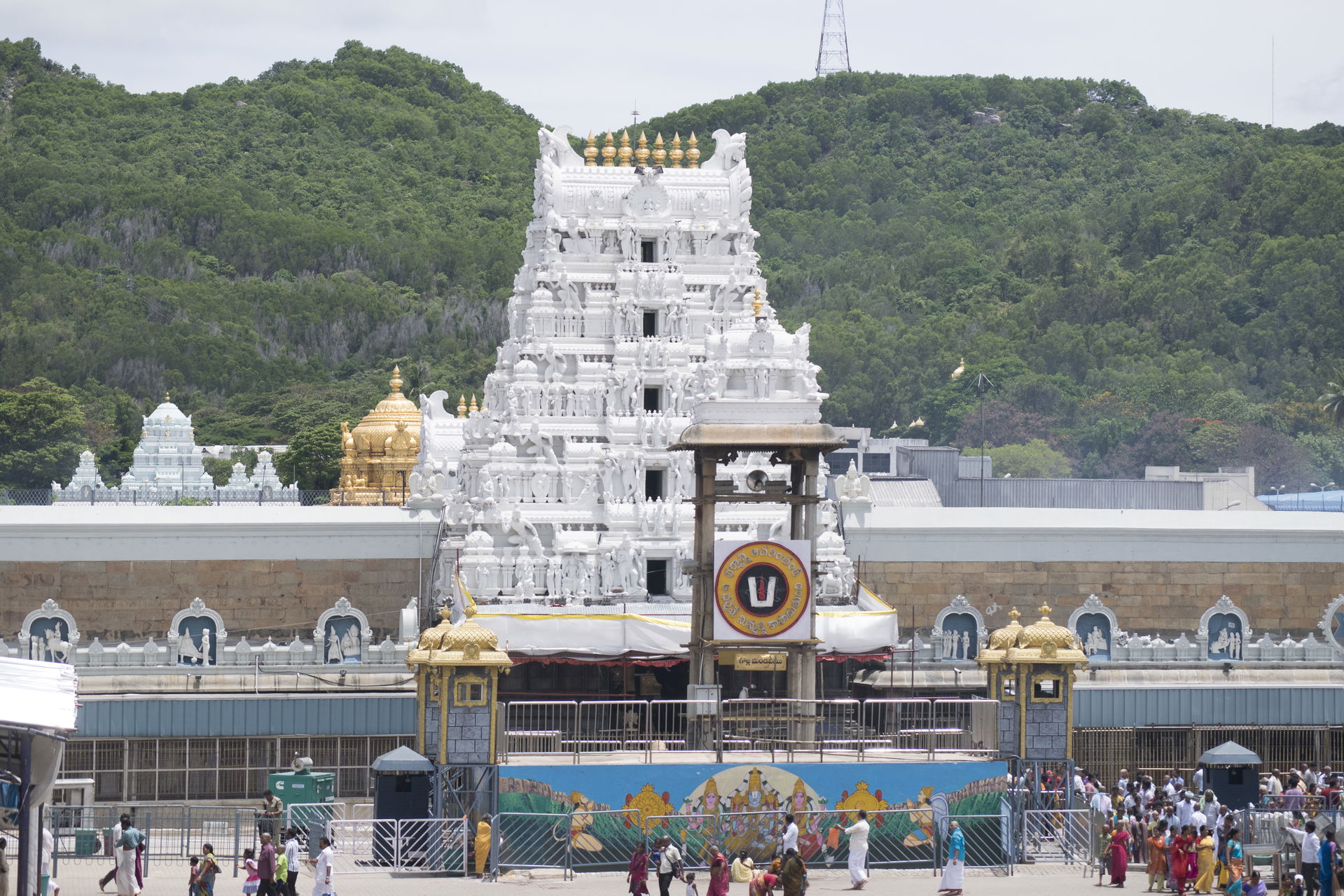 Facade of Tirumala Venkateshwar garbhagriha in the background.