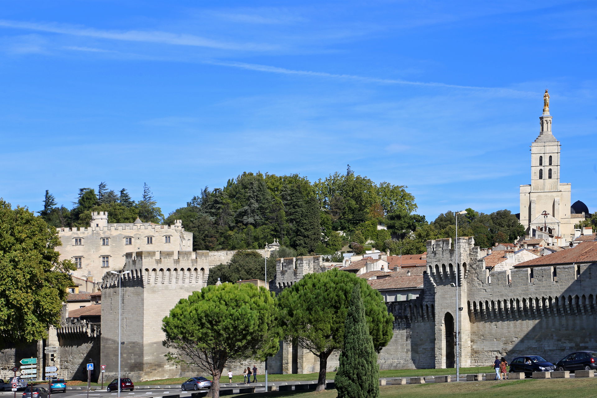 City walls of Avignon, France. In the background on the right i…