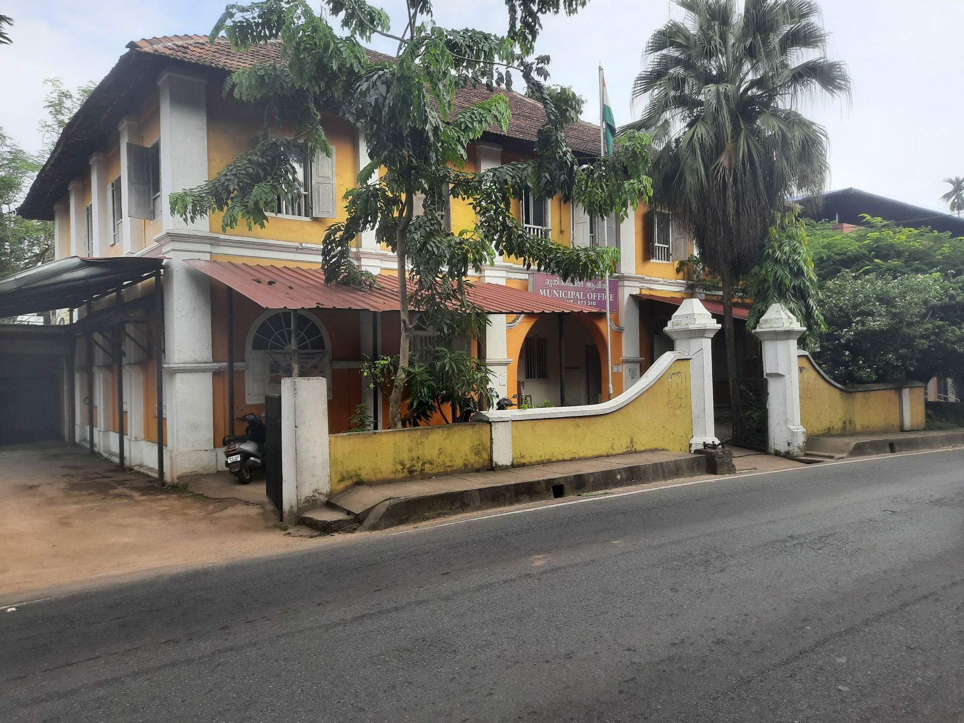 A side view of the Mahe Municipal Office. The Municipal Council…