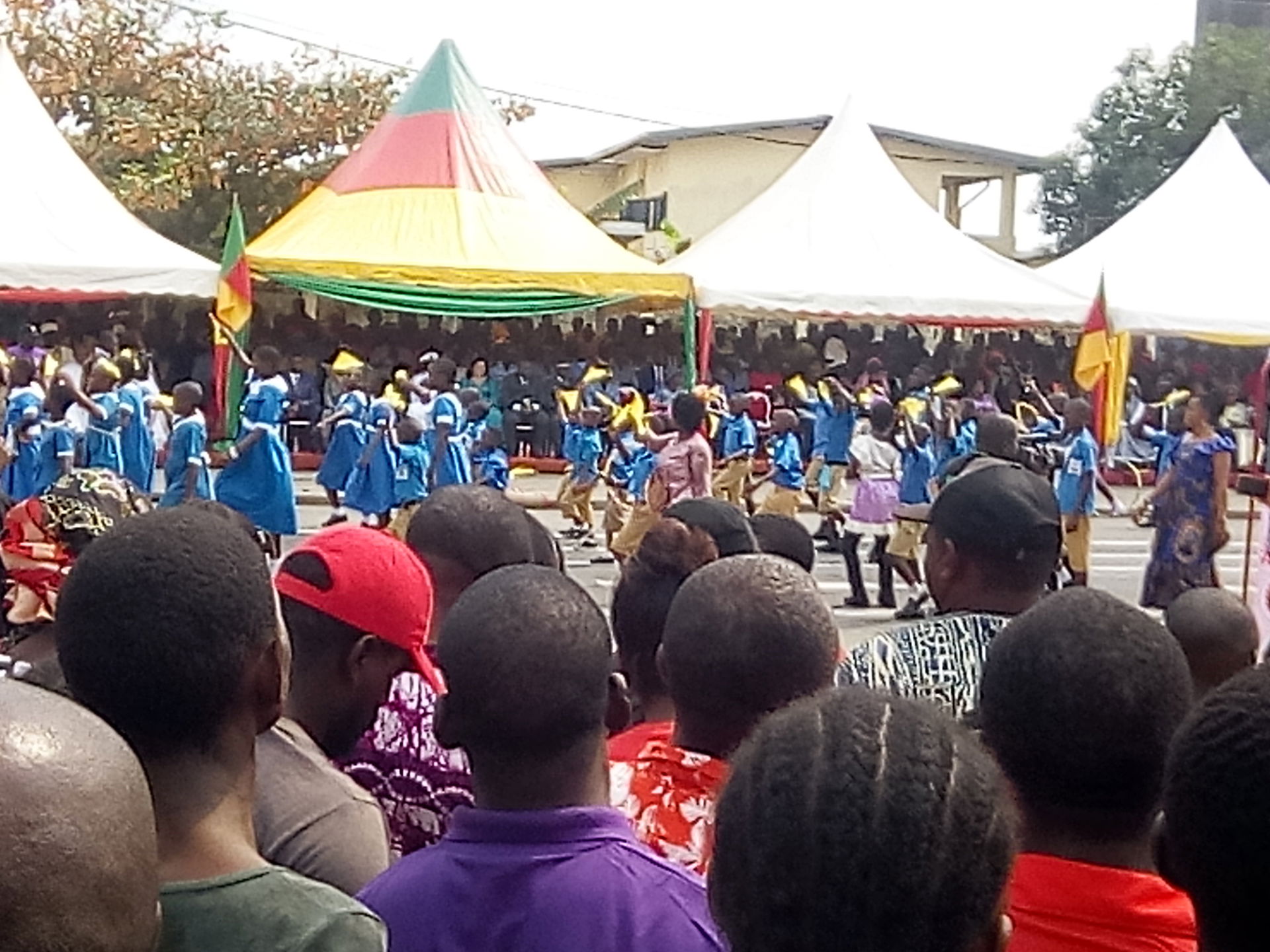Primary school students take part in the Youth Festival parade …