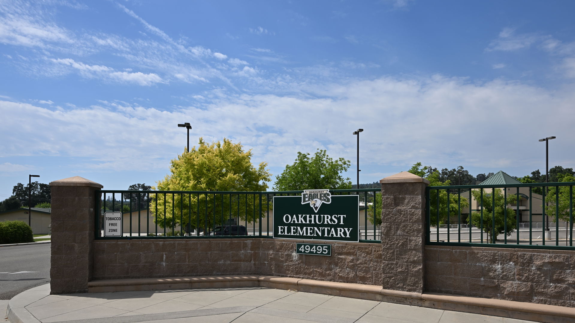 The sign at the entrance to the parking lot for Oakhurst Elemen…