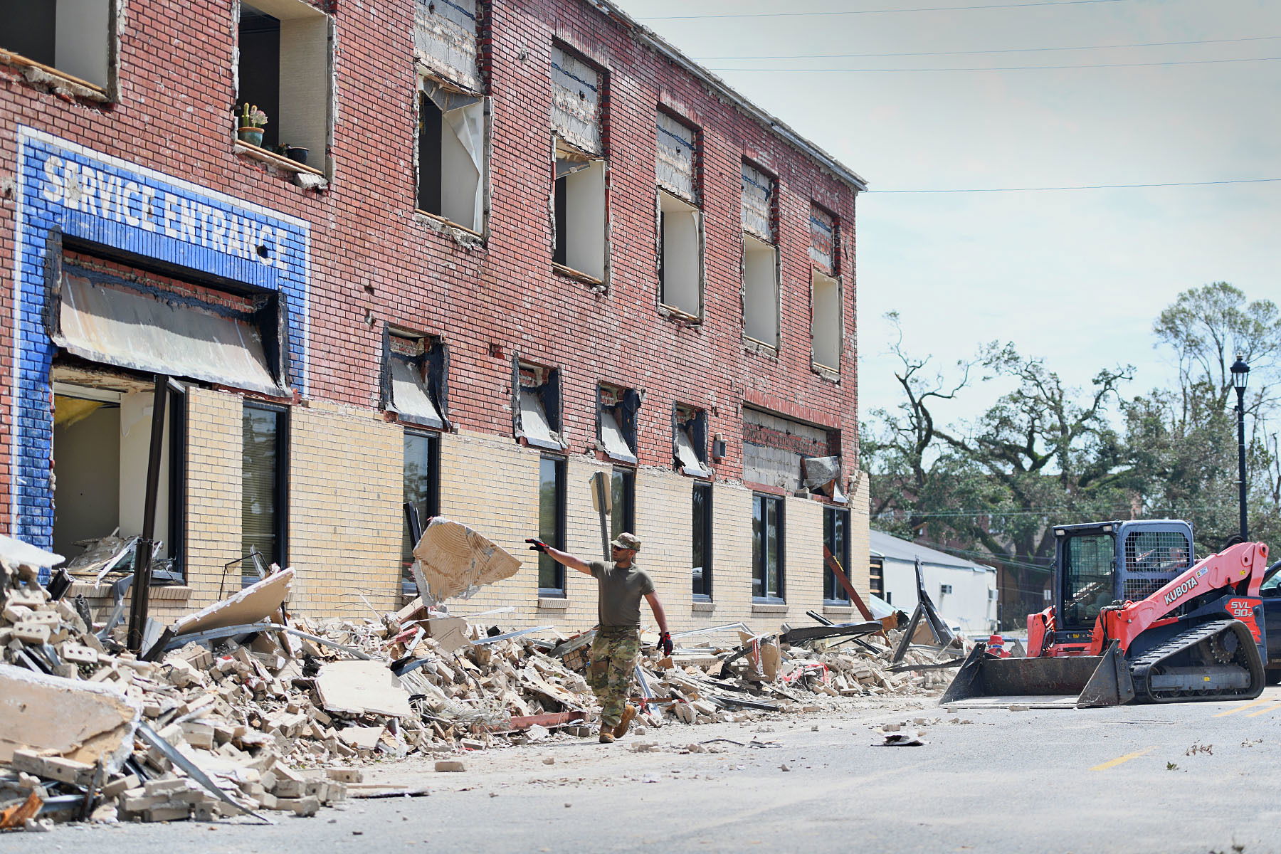 Airmen from the 159th Civil Engineering’s Debris Clearance Pack…