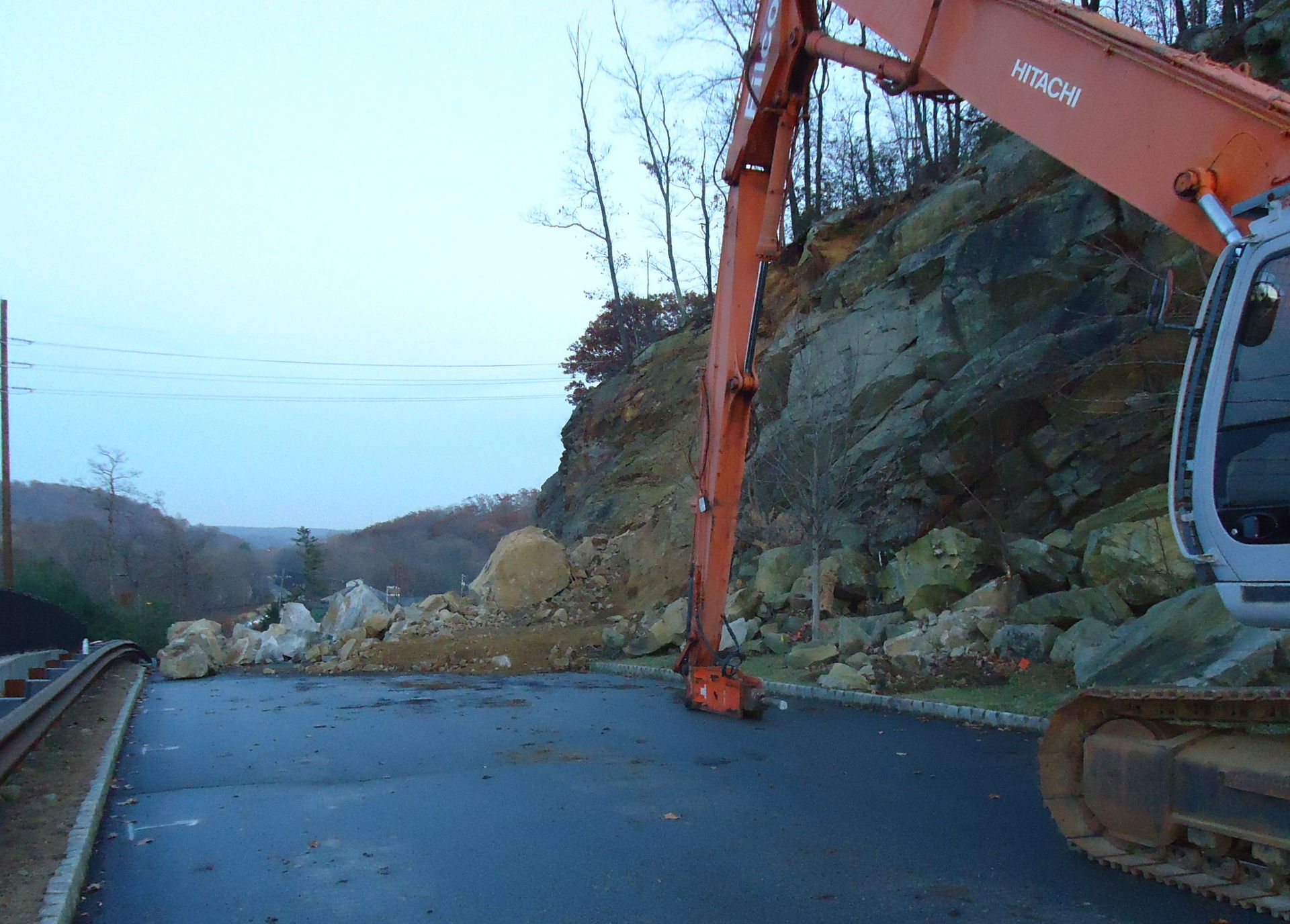An excavation project to remove boulders from side of hill. Ear…