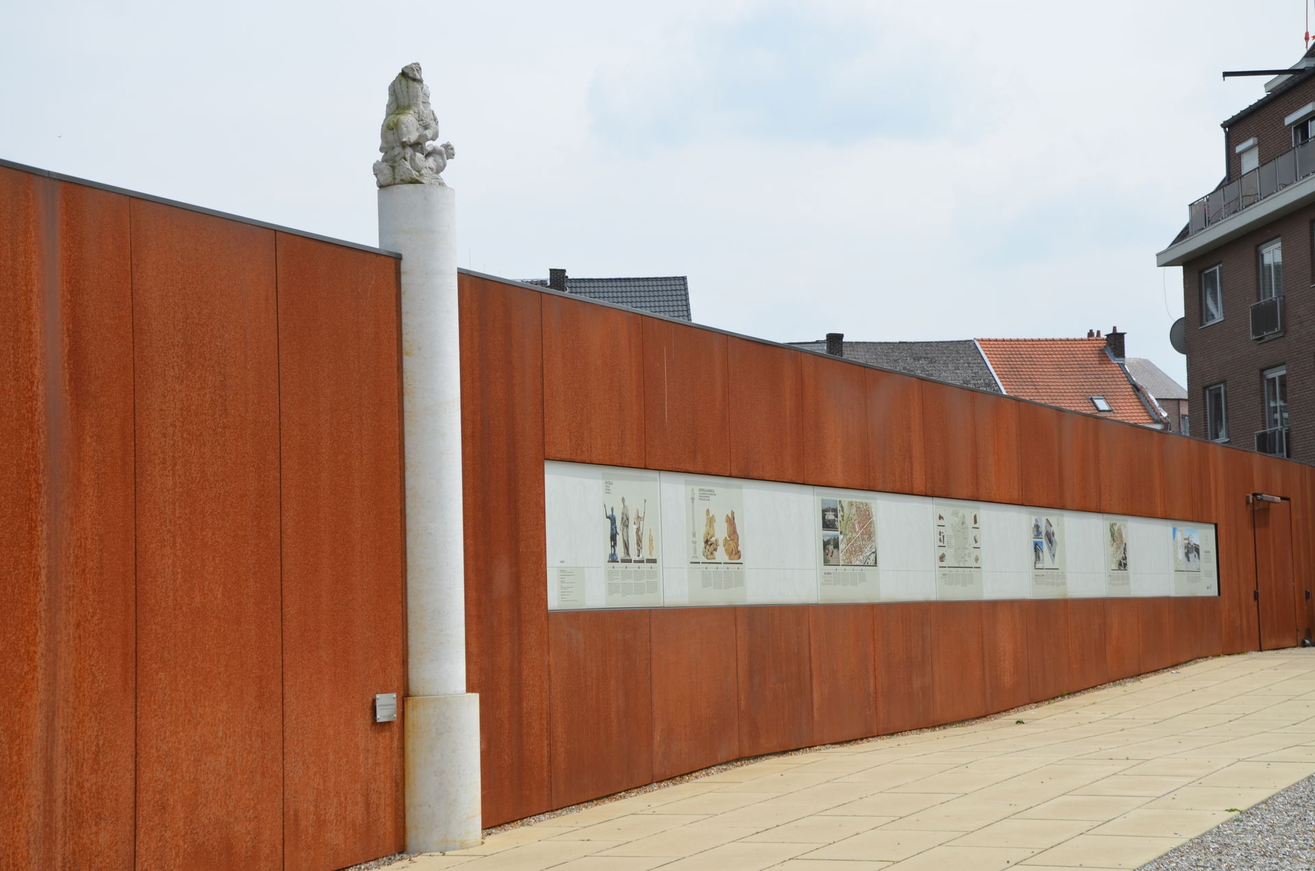 Wall with information panels about the ancient Roman city of At…