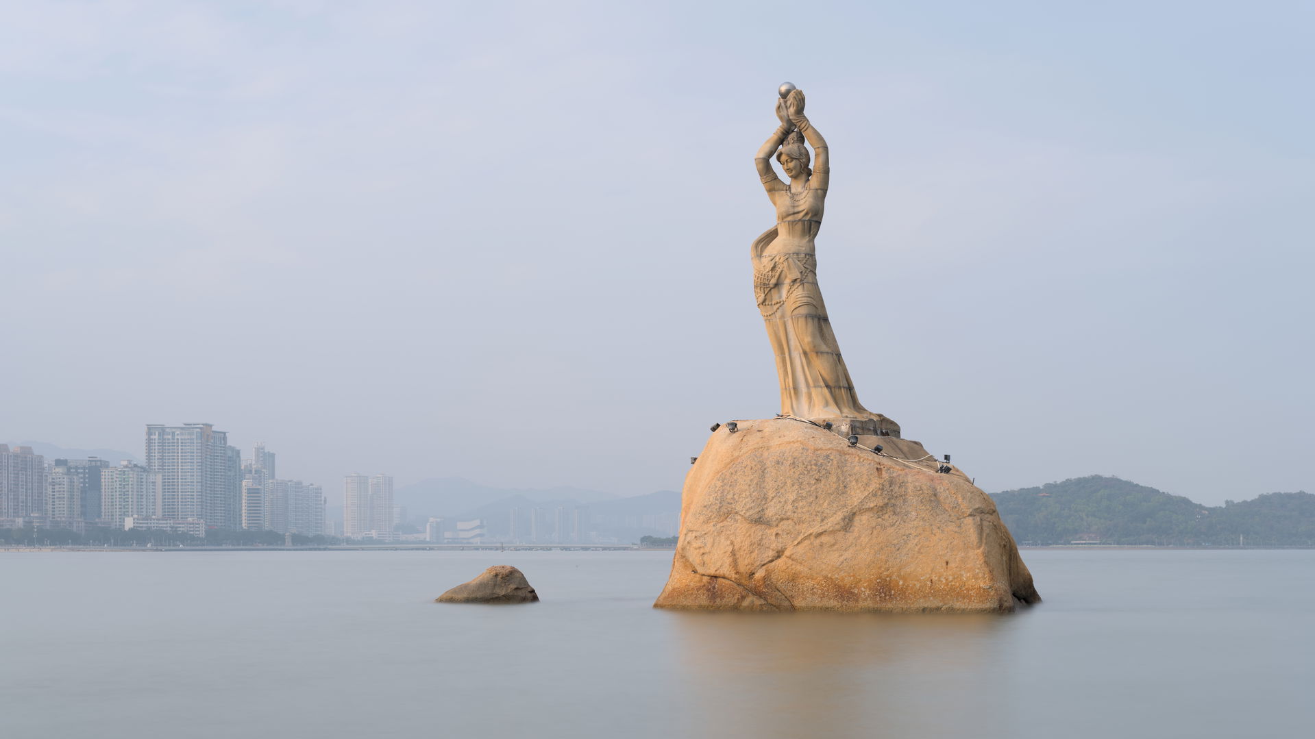 Long exposure of the Zhuhai Fisher Girl statue, a statue by Pan…
