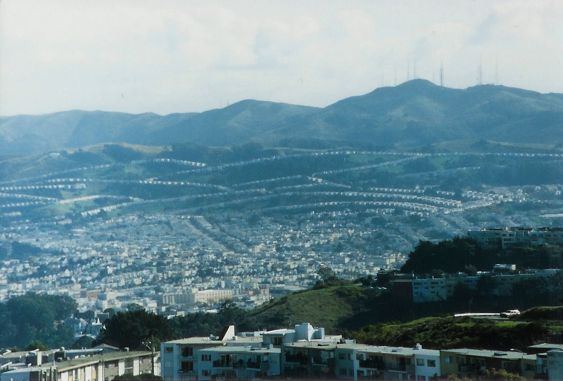 Part of Daly City, California. Background: San Bruno Mountain; …