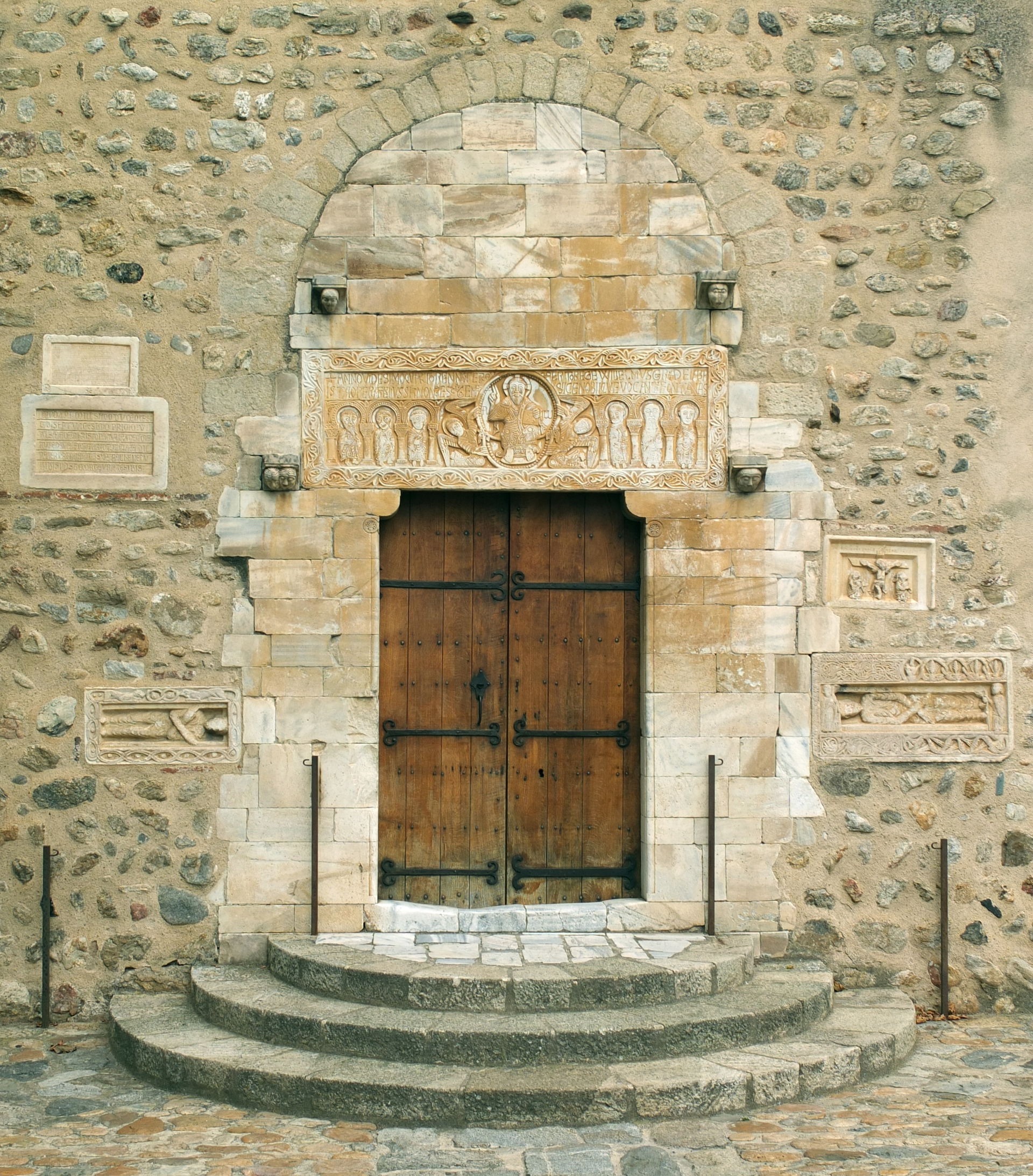 Portal (11th century) of the abbey church Saint-Génis-des-Font…