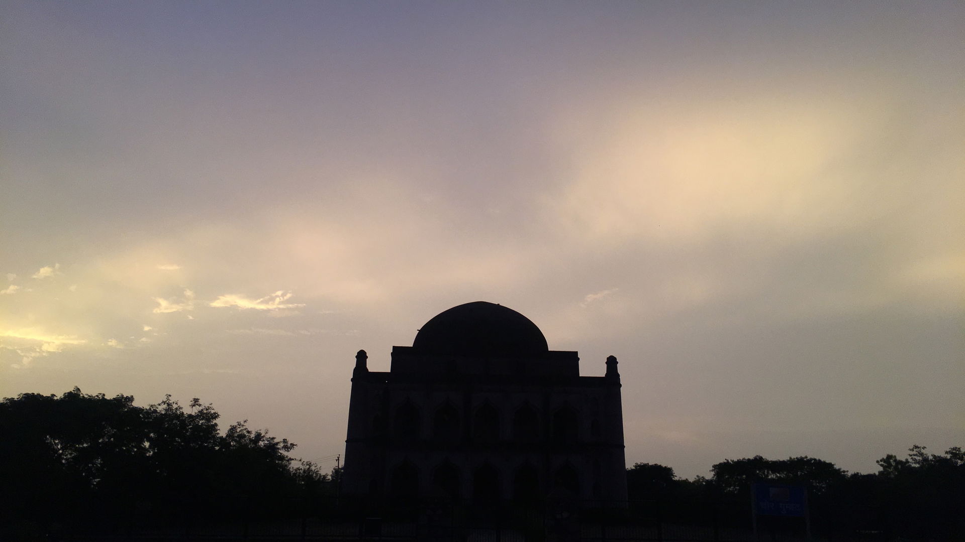 The Chor Gumbad majestically stands upon a rock on the north of…