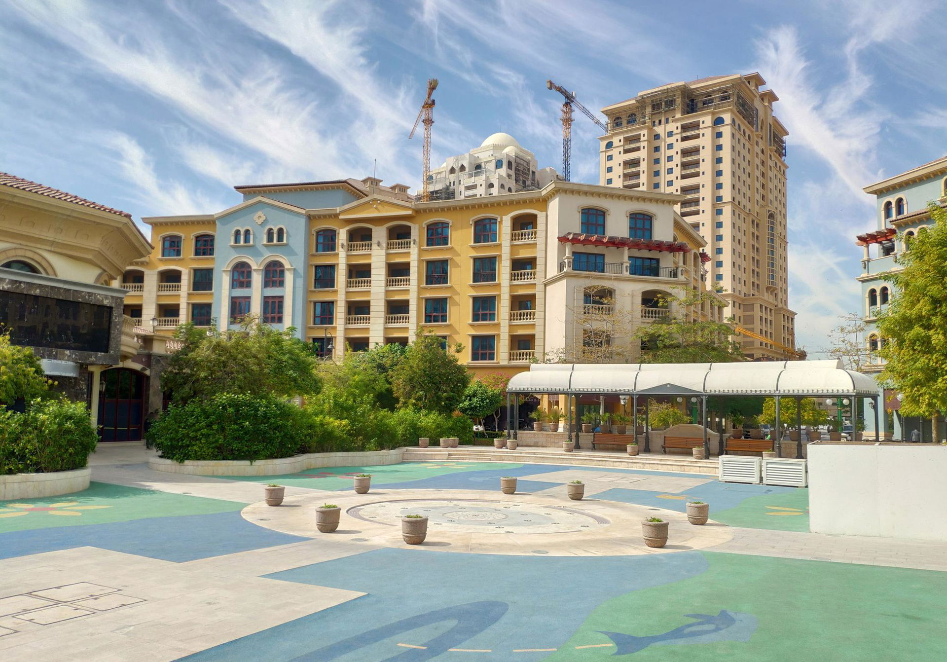 Plaza with benches at The Pearl Qatar.