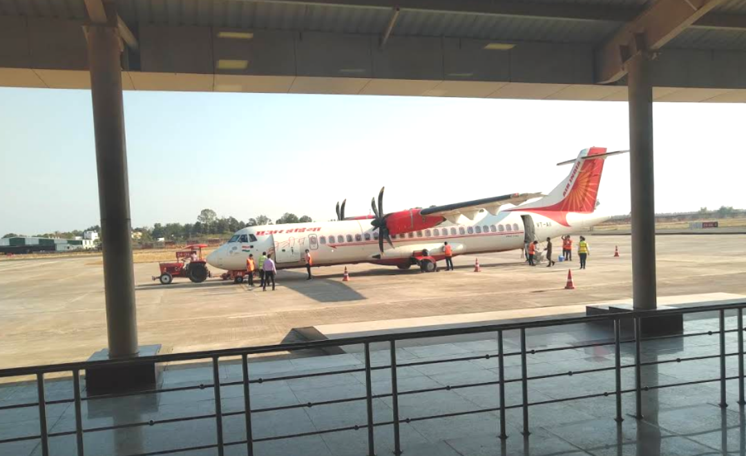 This image shows an Alliance Air Aircraft parked at Jagdalpur A…
