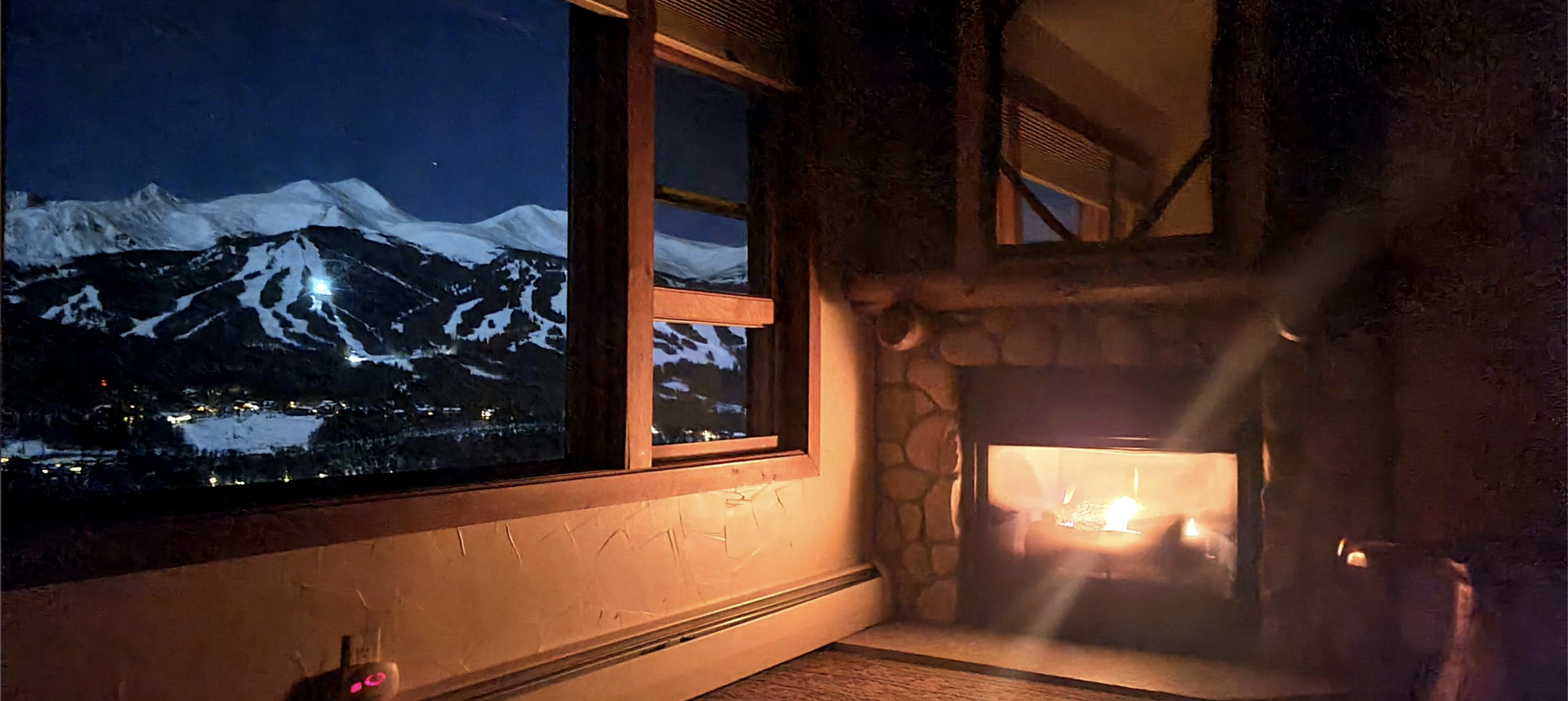 This active fireplace's photo was taken at twilight, in Brecken…