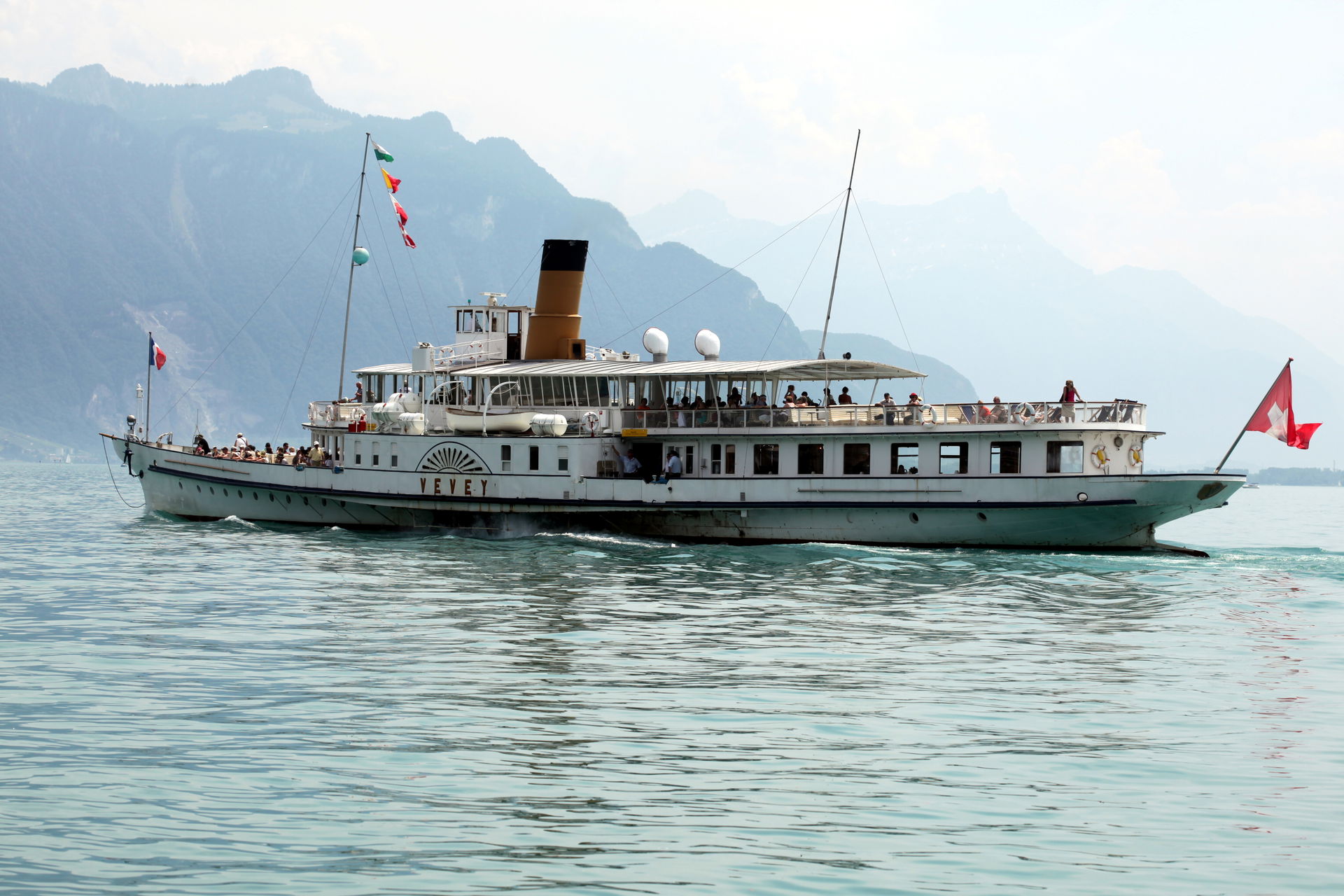 Swiss paddle steamer Vevey departing from Vevey dock.