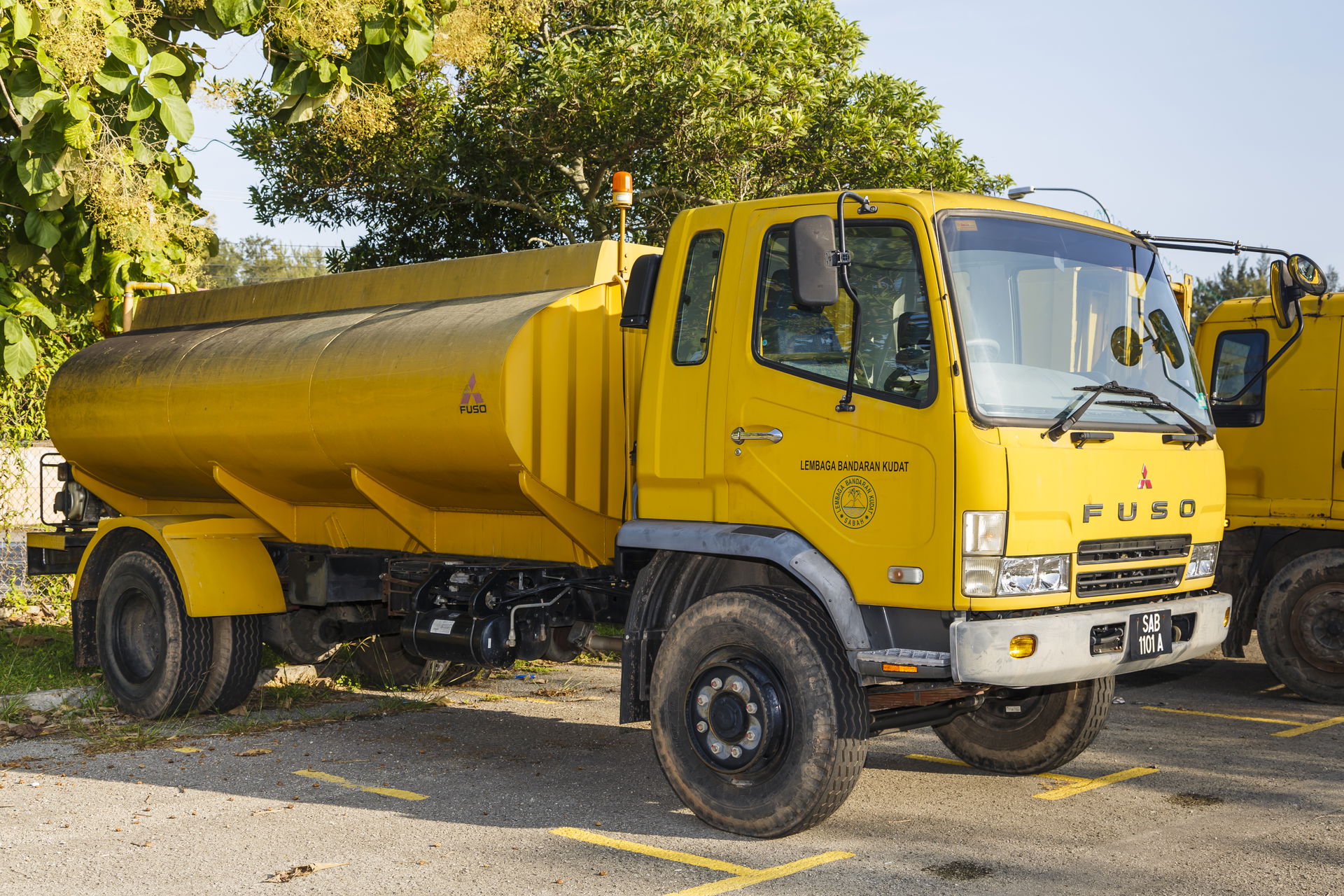 Kudat, Malaysia: A street sprinkling vehicle, model Mitsubishi…