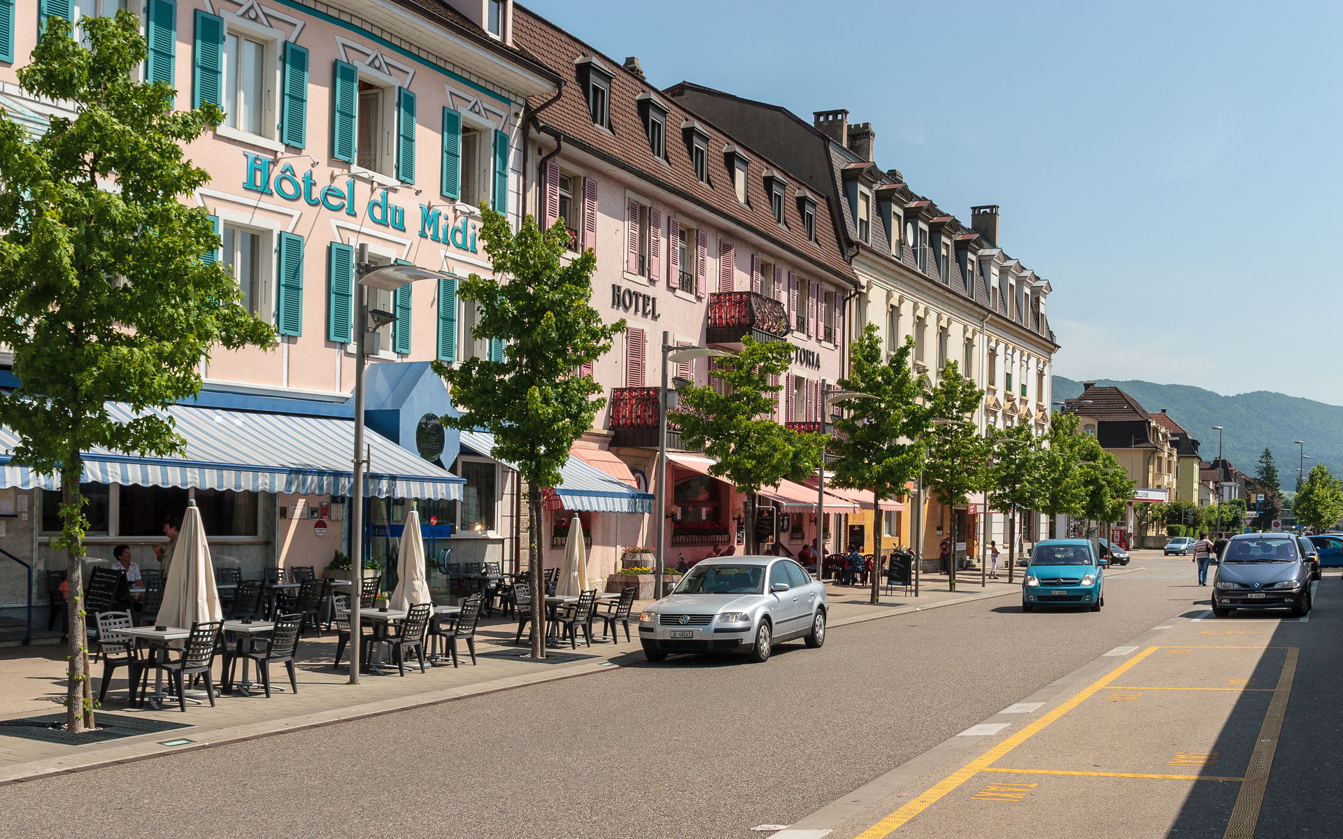 Rue de la Gare (station street) with hotels in Delémont, canton…
